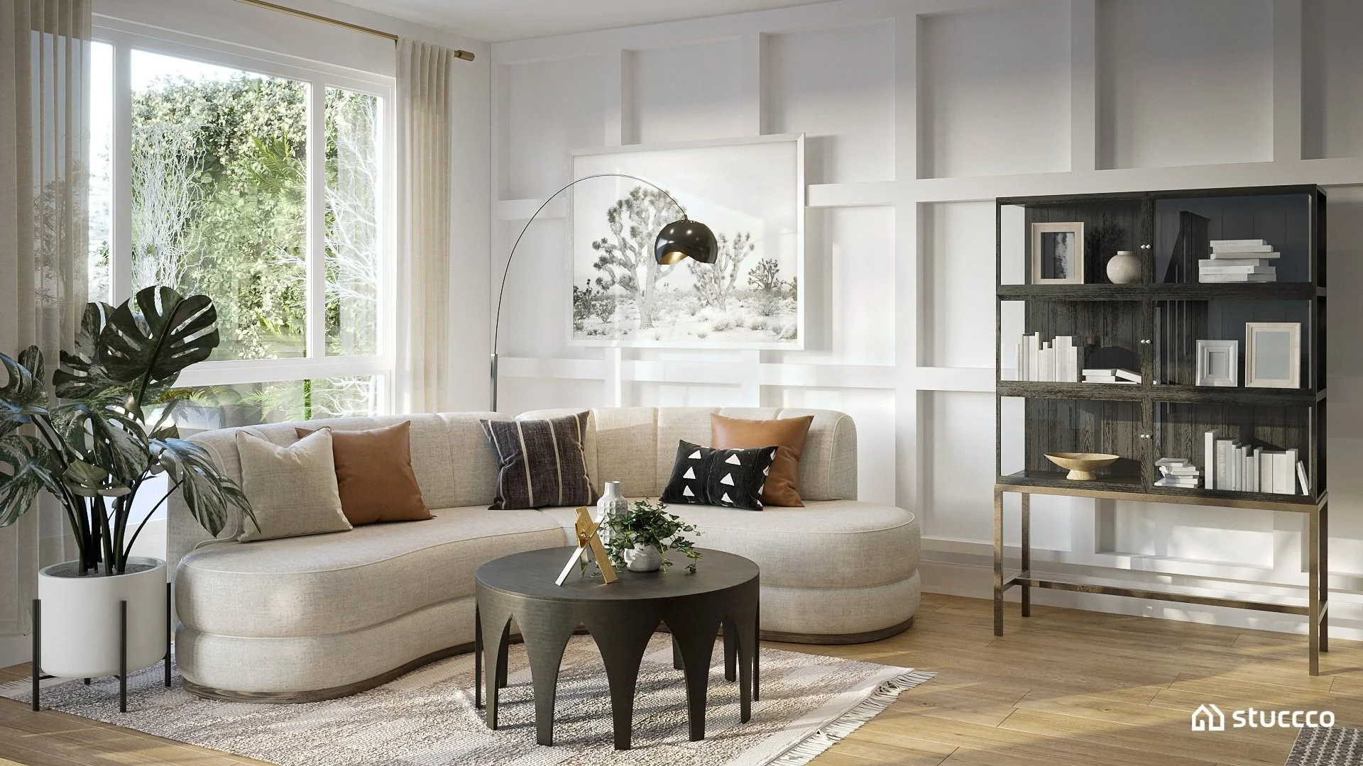 California casual living room with a curved cream sofa, round black coffee table, paneled wall, arc floor lamp, and open bookcase.
