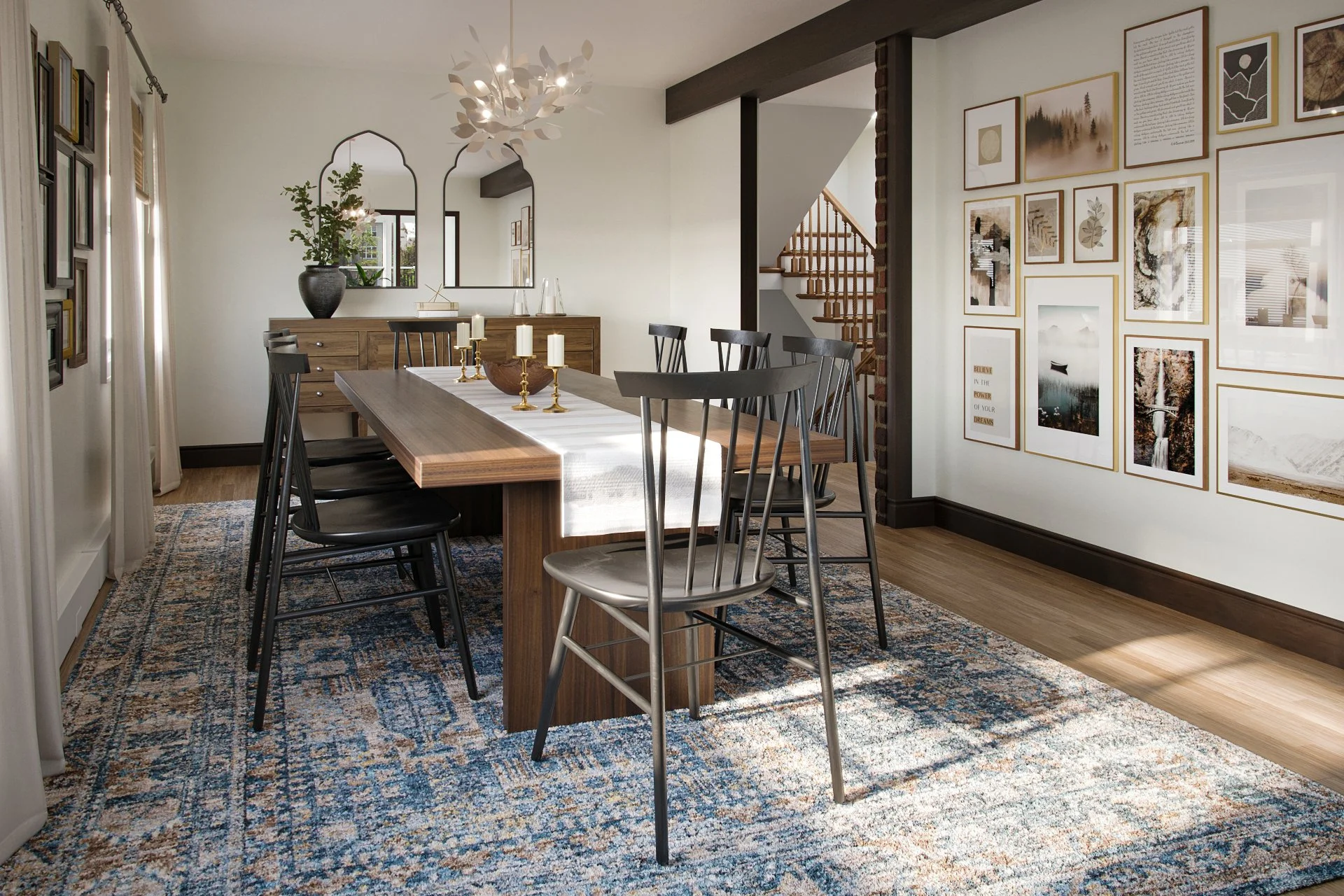 California farmhouse dining room with long wood table, black spindle chairs, gallery wall, chandelier, and patterned area rug, designed by Joshua Jones