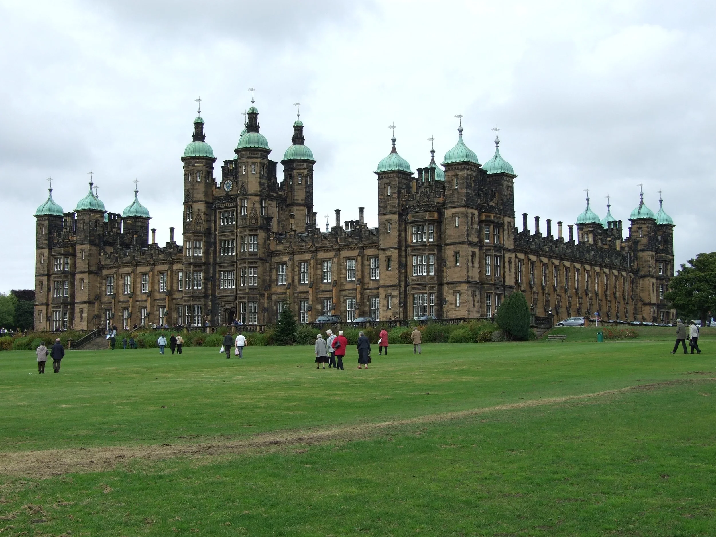 Donaldson’s School for the Deaf in Edinburgh, a historic stone building with castle-like towers now converted into apartments