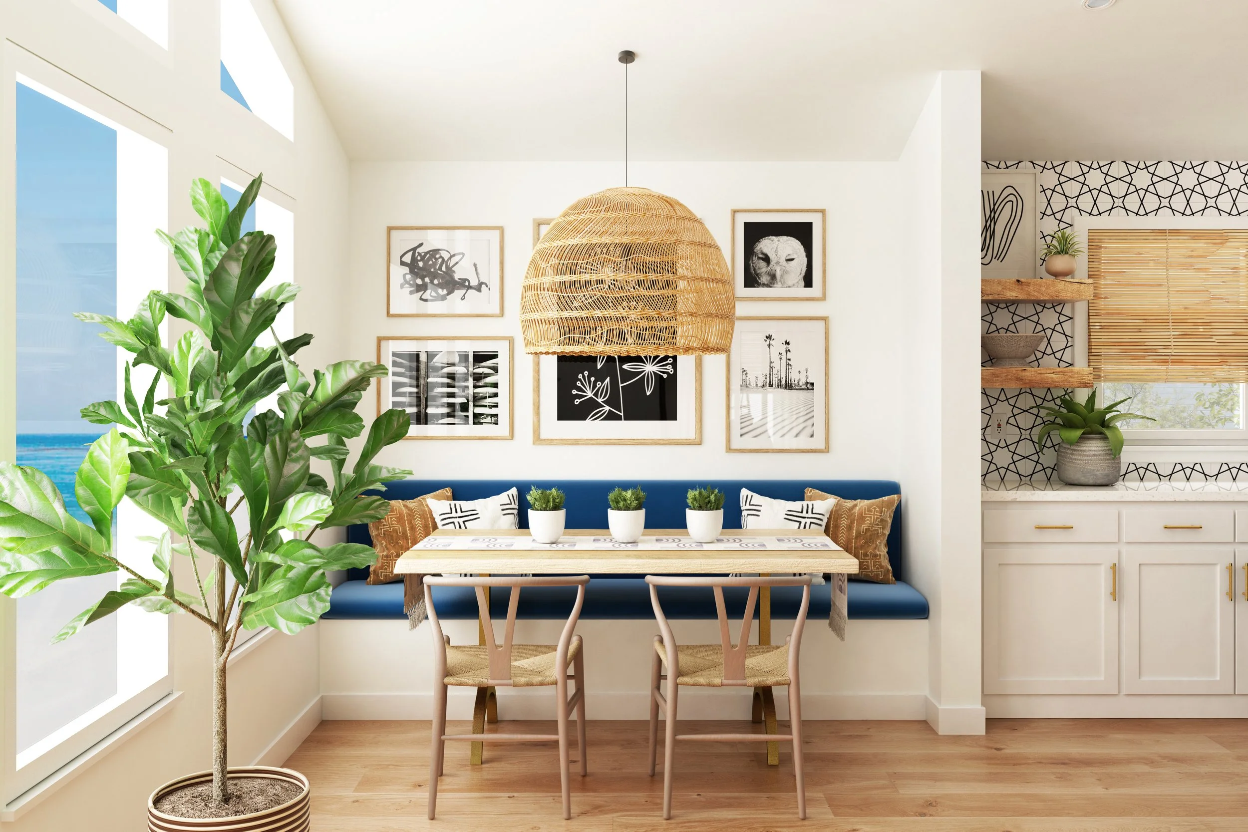 California casual dining nook with a built-in banquette, light wood table, woven pendant light, and coastal-inspired decor in a bright beach house interior.