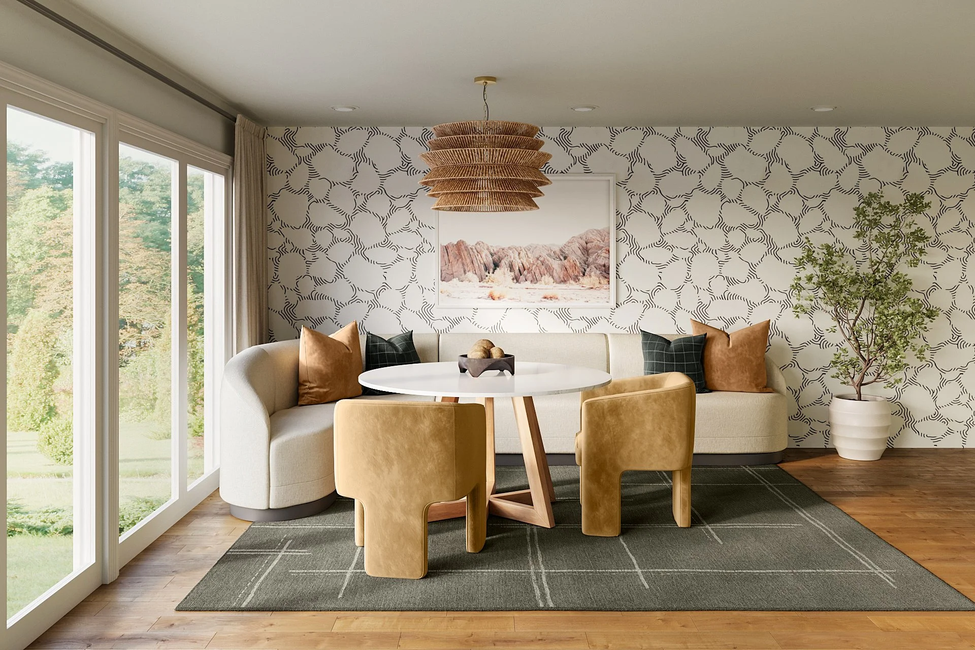 Scandinavian breakfast nook with black and white “Water Surface” wallpaper, curved banquette, round table, and tan chairs—designed by Joshua Jones.