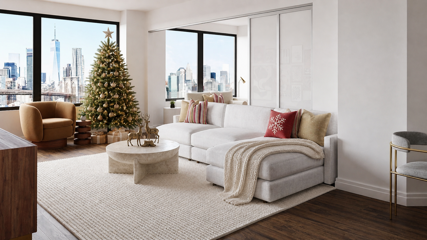 Minimal neutral living room with a Christmas tree, soft holiday pillow and throw blanket on a sectional sofa, and bronze deer sculptures on a coffee table.