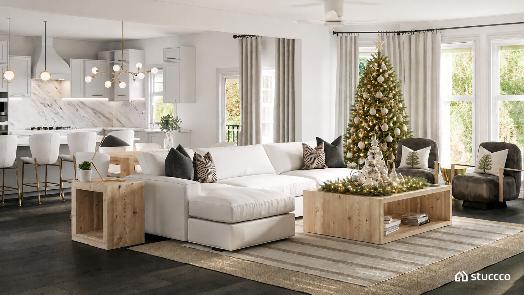 Modern Organic open-concept family room, dining room, and kitchen with neutral tones, wood furniture, a decorated Christmas tree, and holiday garland styling on the coffee table.