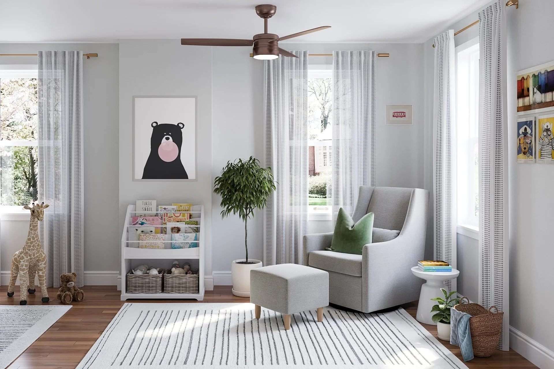 Contemporary gender-neutral nursery designed by virtual interior designer Joshua Jones of JJones Design Co. with neutral palette, upholstered chair, ceiling fan, children’s bookshelf, and minimal decor.