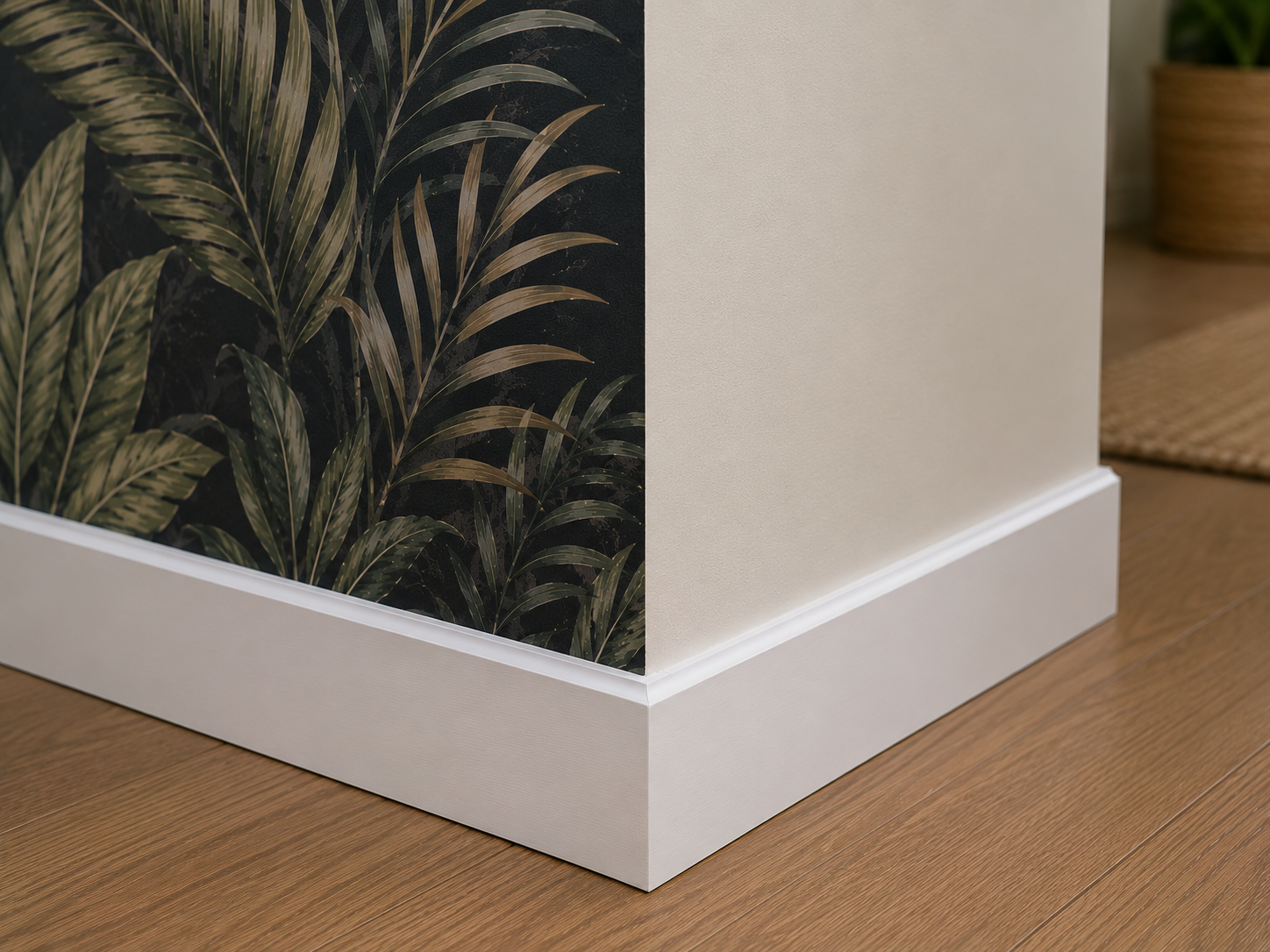 AI-generated close-up of a square drywall corner with dark tropical wallpaper meeting a light painted wall beside white baseboards and wood flooring.