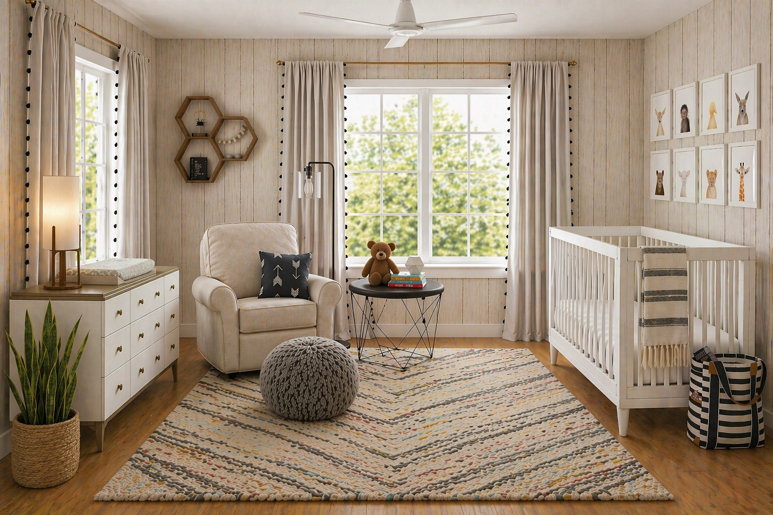 Modern neutral nursery designed by virtual interior designer Joshua Jones of JJones Design Co. with white crib, reading chair, pouf, wood dresser, large windows, and soft textured rug.