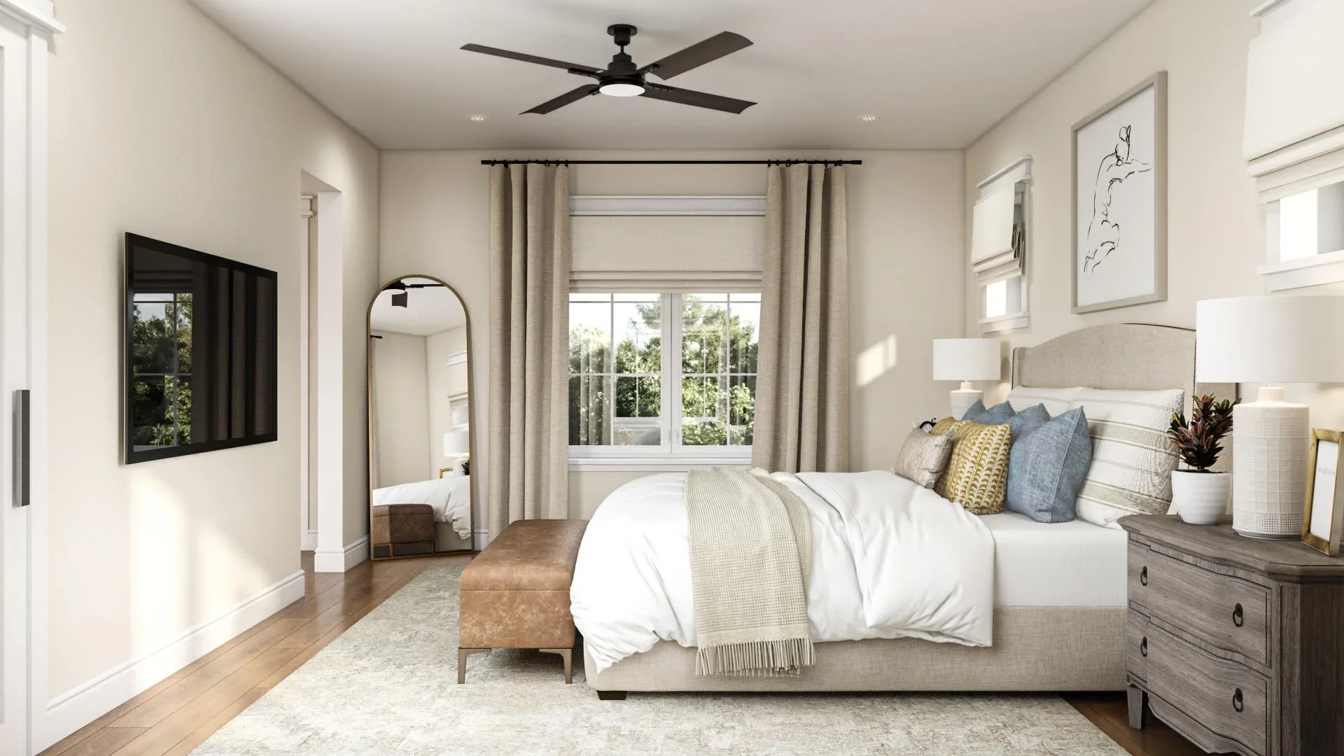 Transitional primary bedroom with upholstered bed, neutral bedding, light wood flooring, ceiling fan, soft drapery, and balanced, minimal decor.