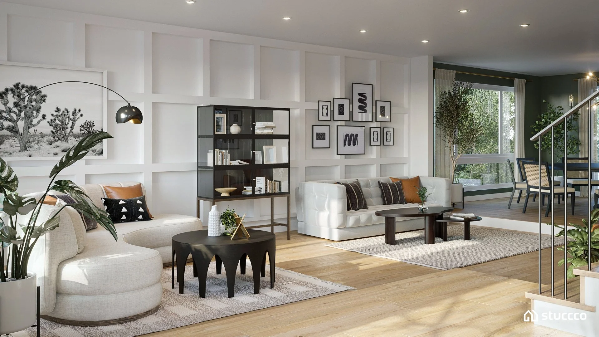 California casual living room with curved lounge chairs, neutral sofa, black accent tables, paneled wall, and open layout connecting to dining area, designed by Joshua Jones
