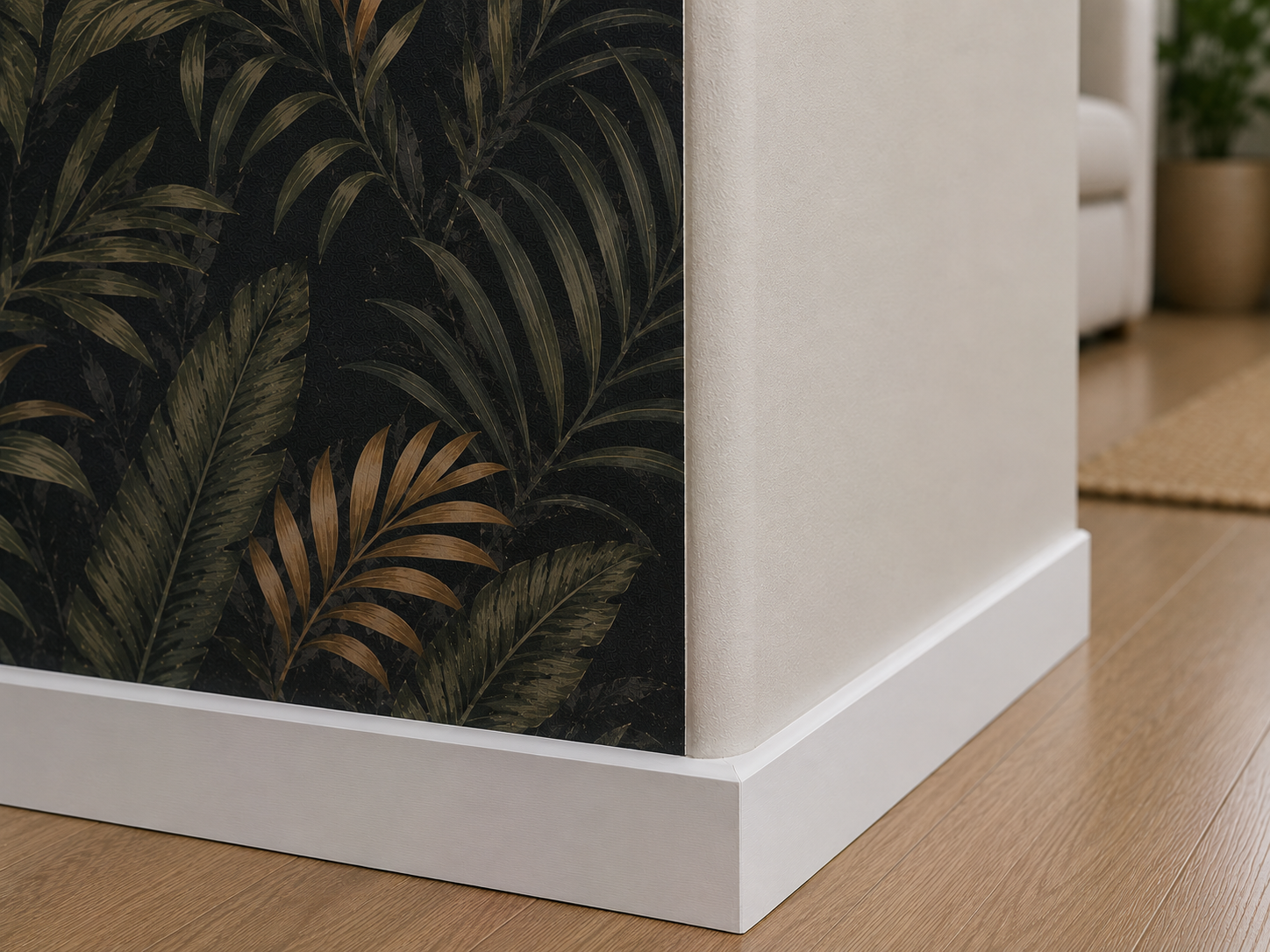 AI-generated close-up of a rounded drywall corner featuring dark tropical wallpaper stopping before the curved edge beside a light painted wall and square white baseboards.