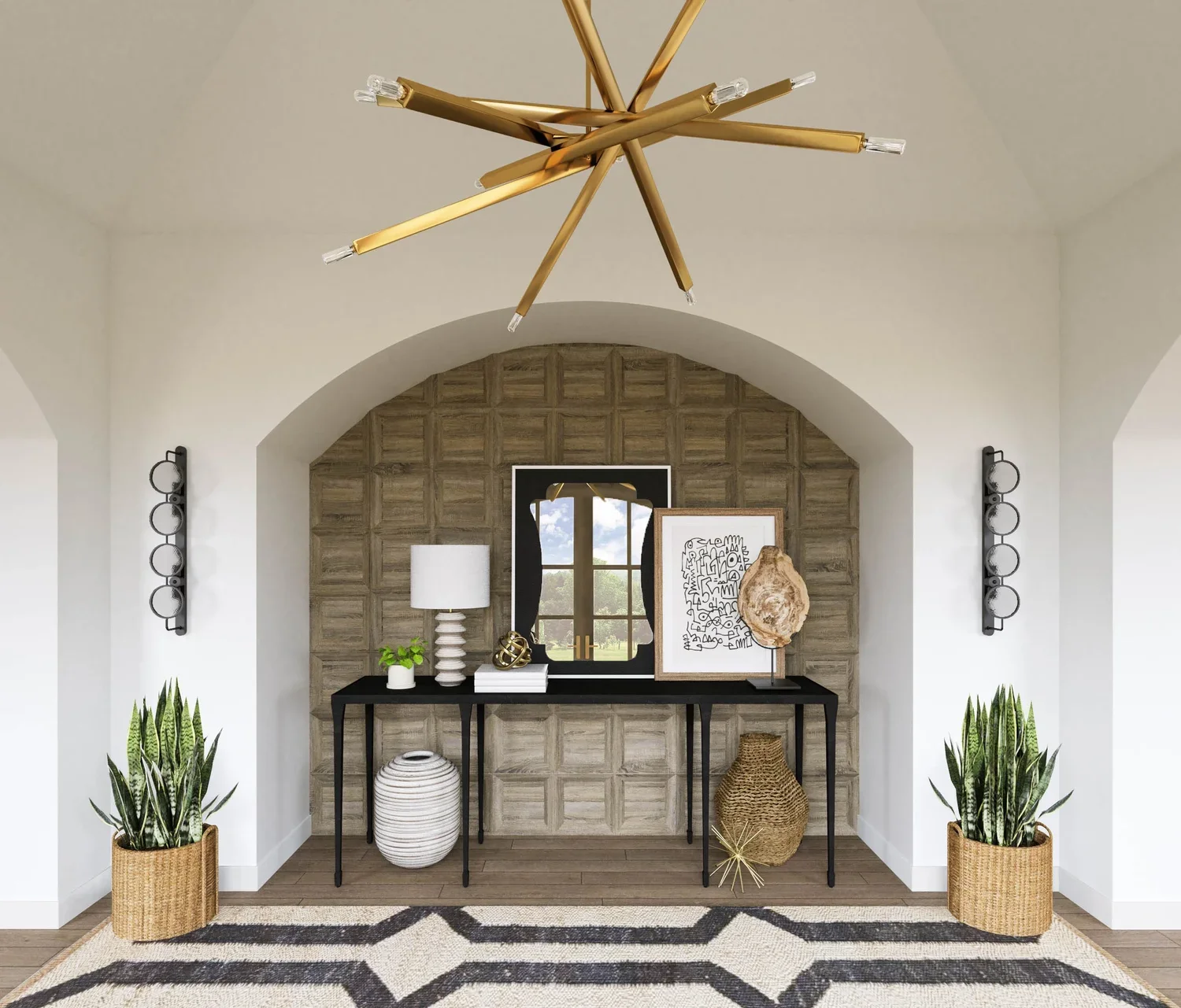 Luxury California casual style foyer interior design with arched alcove, wood wall paneling, styled console table, and brass chandelier by Joshua Jones of JJones Design Co.