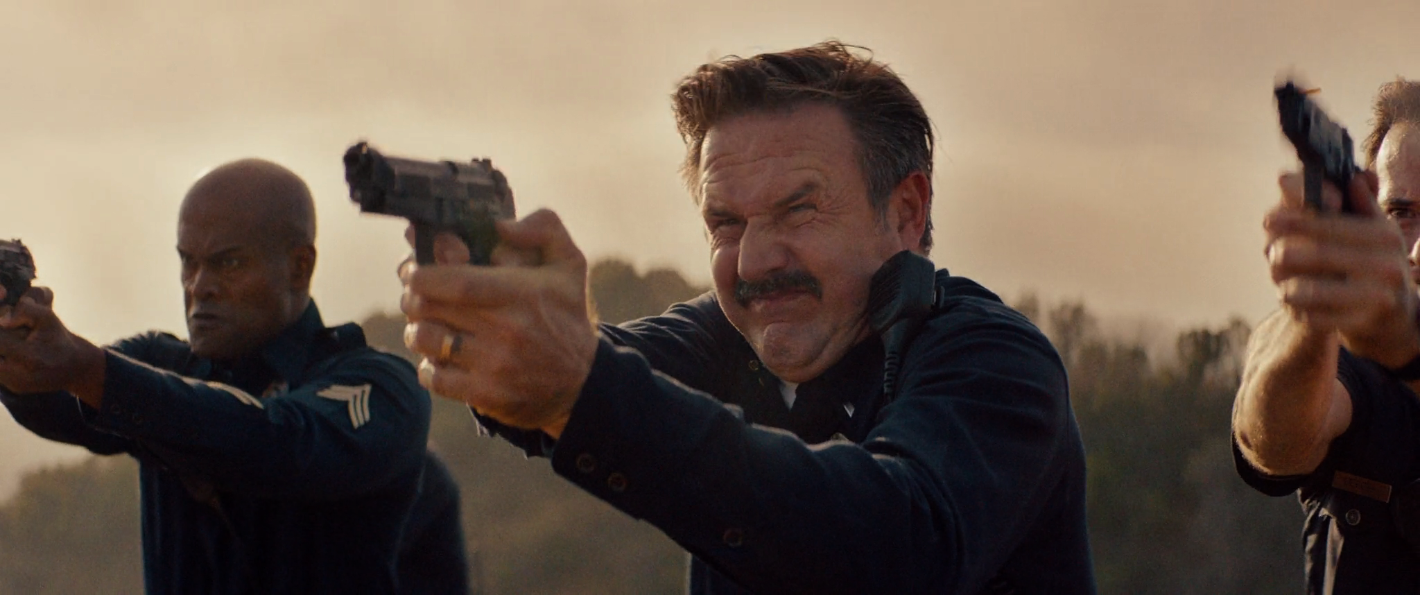 THE BIG BREAK TRAILER Arquette gun.png