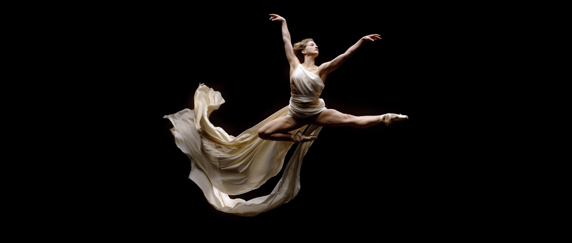 Dancer in mid leap in ACER dance commercial | New York Cinematographer, Director of Photography Derek McKane