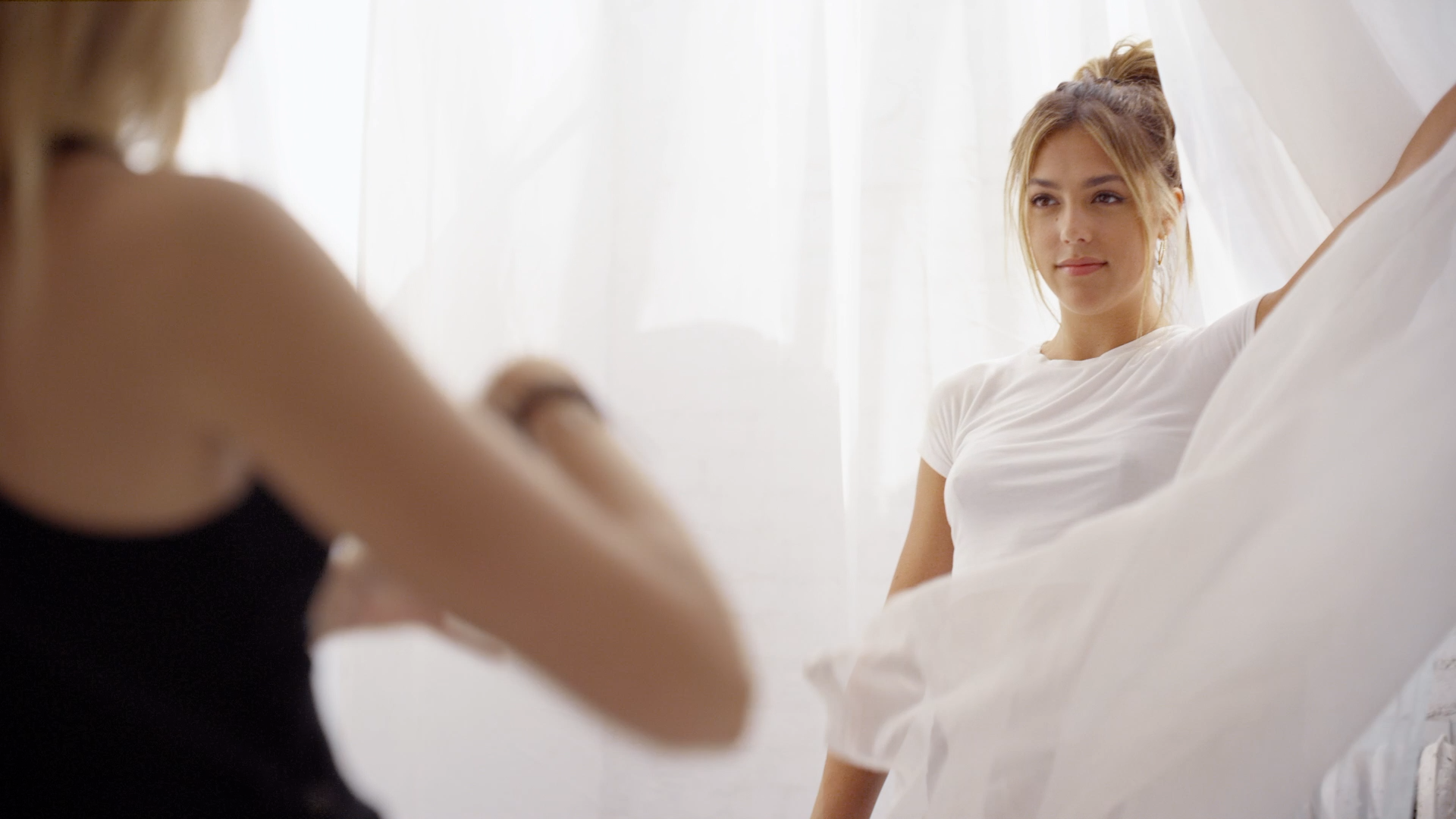 Sistine Stallone draped in sheer curtains in ARE YOU AM I fashion commercial | Derek McKane NY Cinematographer