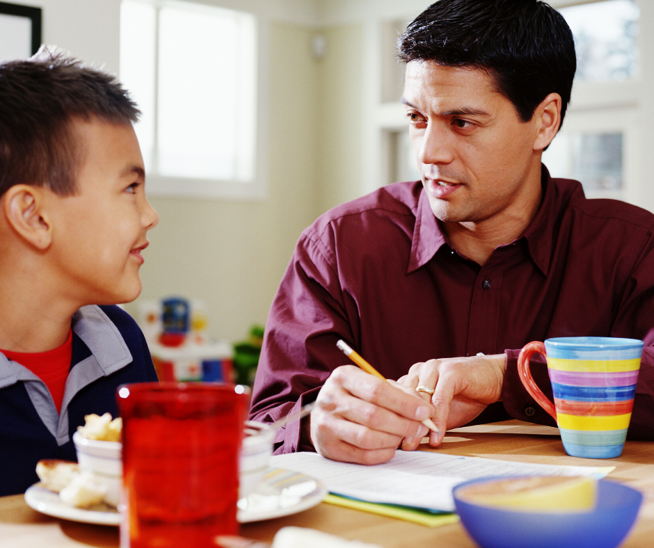 young Asian getting tutored .png