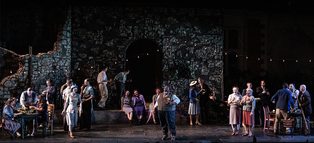 Keel Watson as Baldassare and the Opera Holland Park Chorus L’ARLESIANA at Opera Holland Park, July 2019 Photo: Ali Wright
