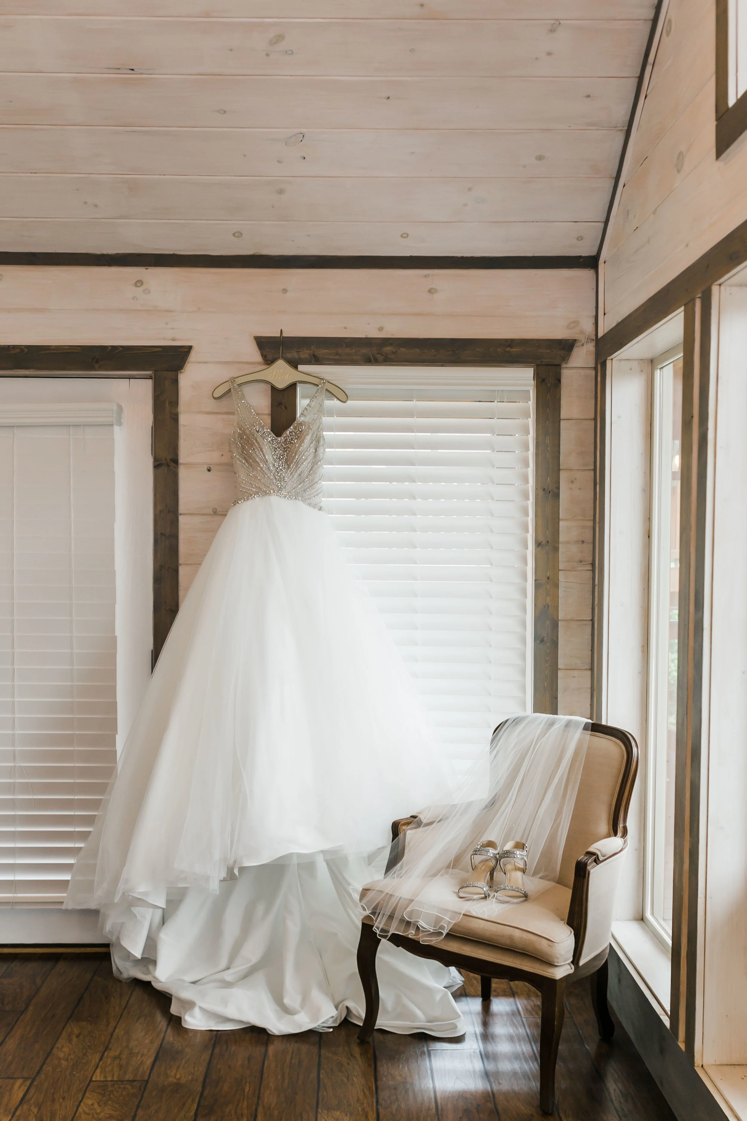 sottero and Midgley dress hanging magnolia venue bridal suite