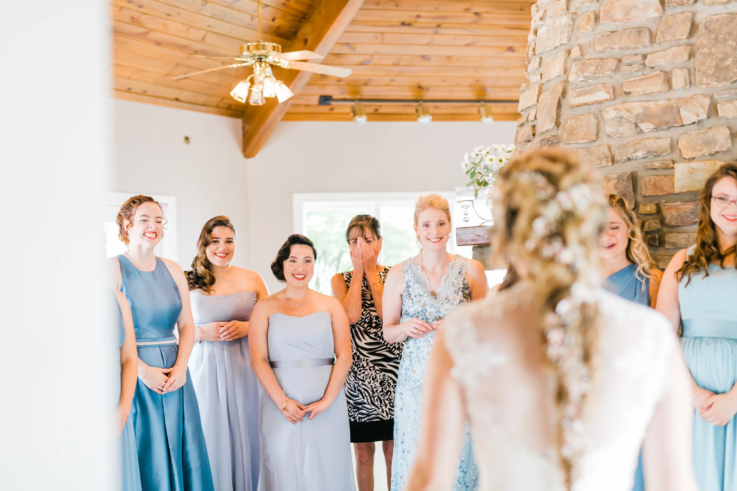 first look with bridesmaids in blue dresses Daras garden