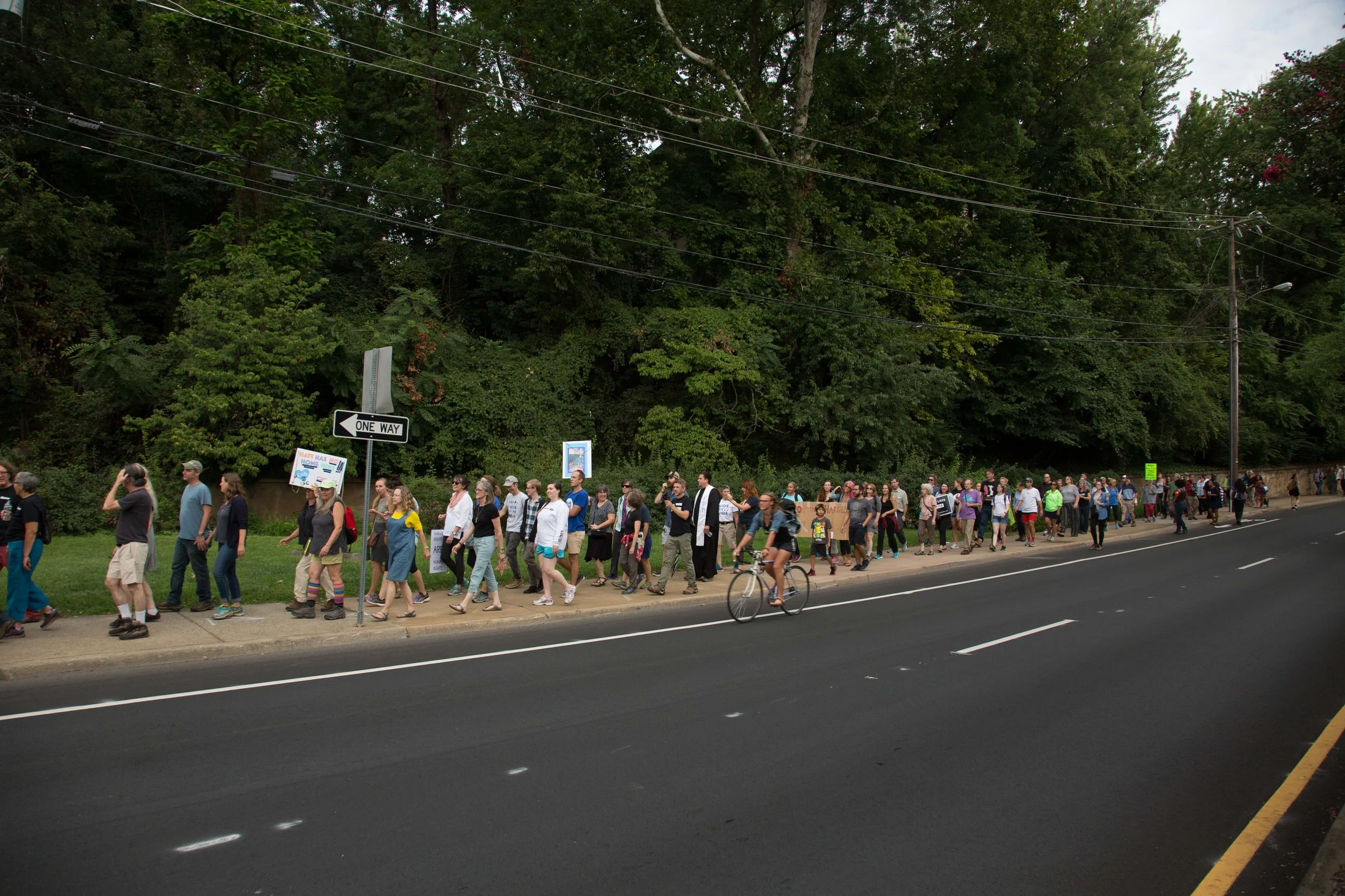 Protesters of the Charlottesville tragedy begin their 10 day action as they march from Charlottesville, Virgina to Washington D.C. Organizers Nelini Stamp of the Workign Famlies Party and Mohammed Naeem lead the action into the begining of the week. The first day consisted of roughly 200 protesters who came out for the blessing and the first 3 miles of the march. Fellow organizations include the Women's March, Working Families Party, Action Network, and Rogue Photo. Cville2DC.us