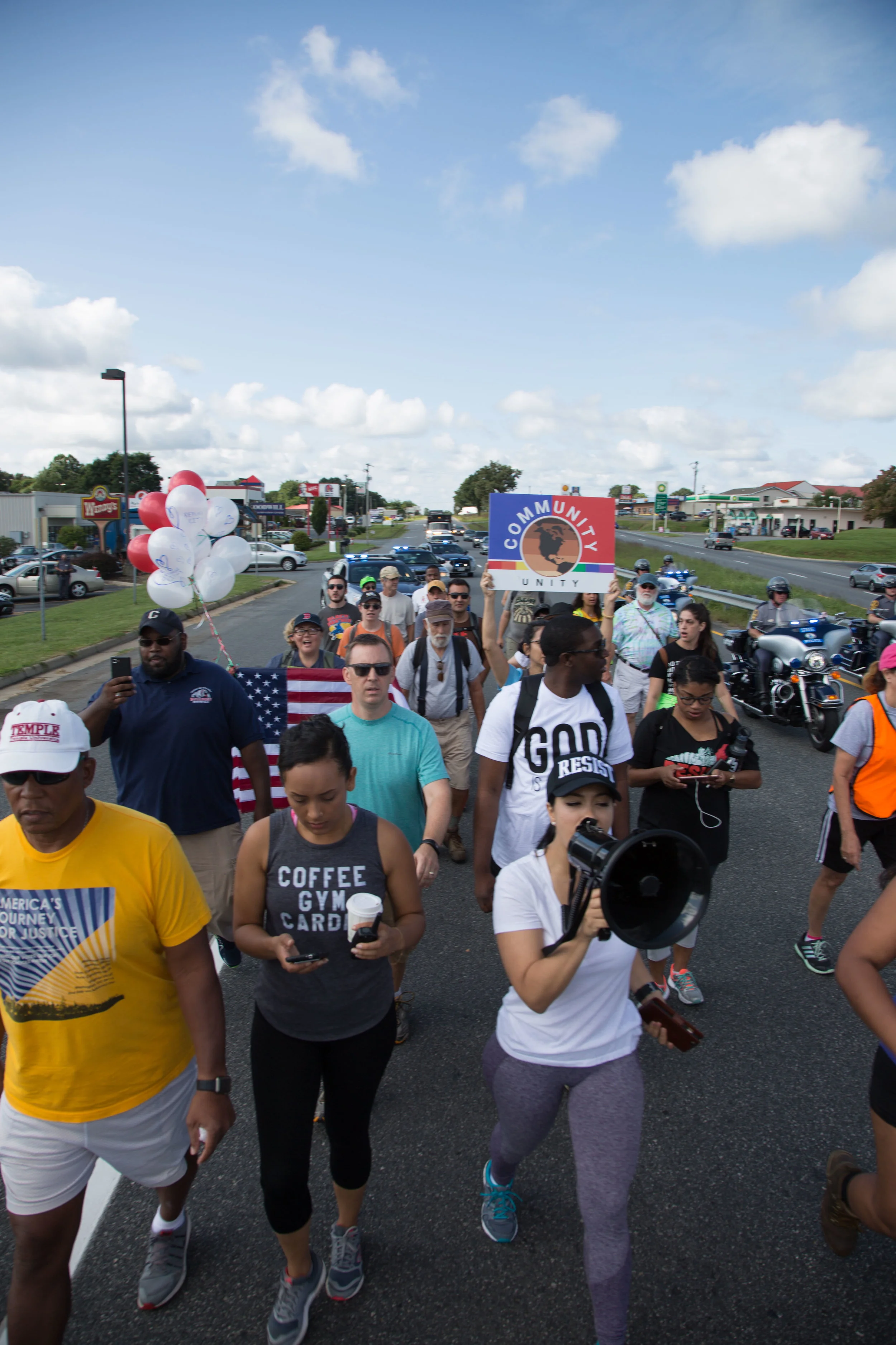 Activists continue their march from Charlottesville, Virginia to Washington, D.C. for a third day on August 30, 2017. The march, which is in protest against white supremacy, originally started with around 200 participants. Around 30 are continuing the movement, which will take around ten days.