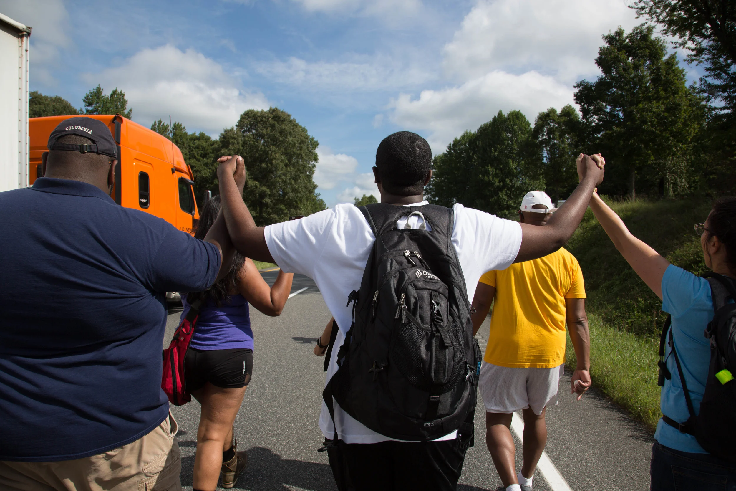 Activists continue their march from Charlottesville, Virginia to Washington, D.C. for a third day on August 30, 2017. The march, which is in protest against white supremacy, originally started with around 200 participants. Around 30 are continuing the movement, which will take around ten days.