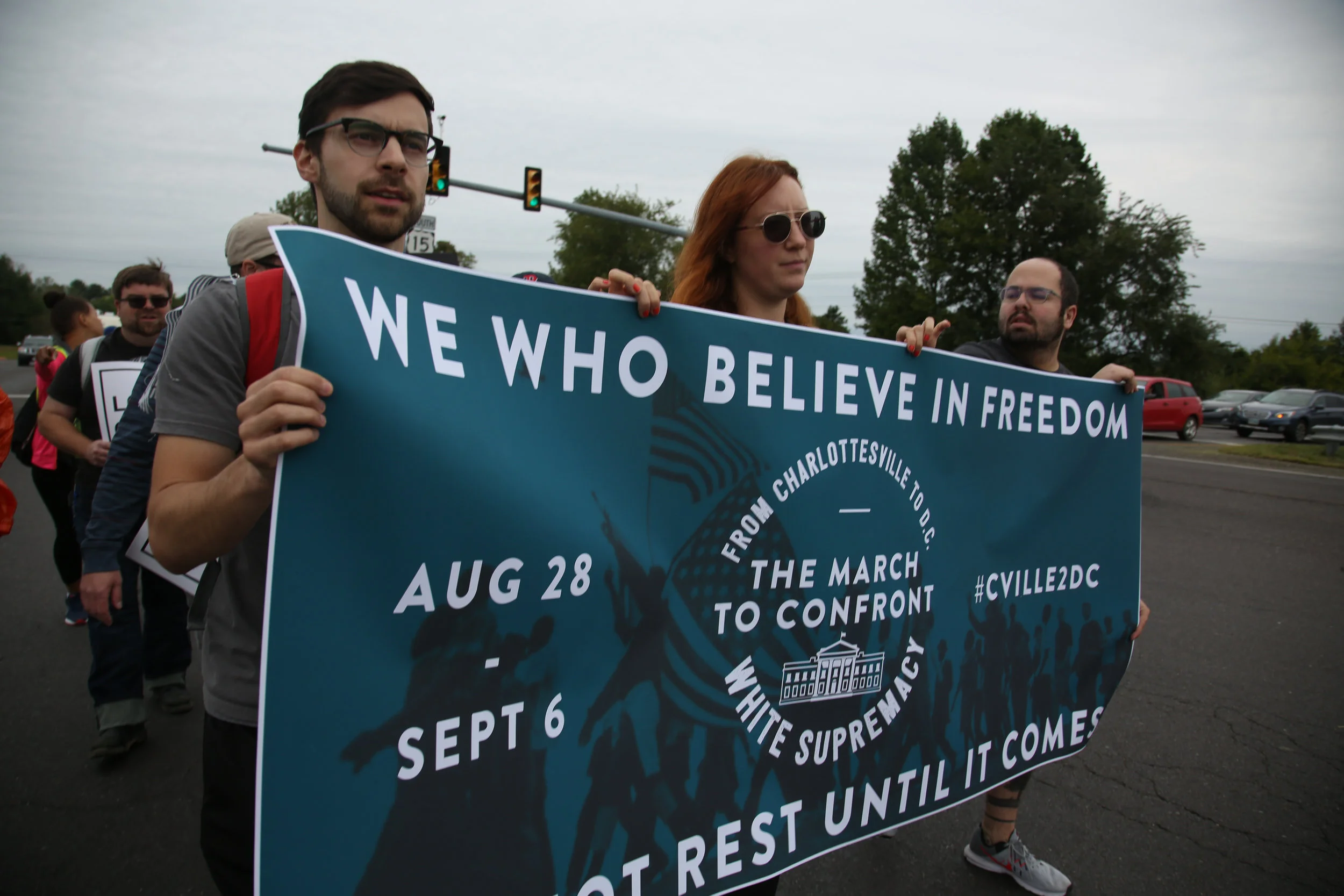 Protesters against white supremacy continue their protest march from Charlottesville to Washington, D.C. along a road in Virginia on September 1, 2017. They set off for the trek on Monday and have reportedly been halted by state police.