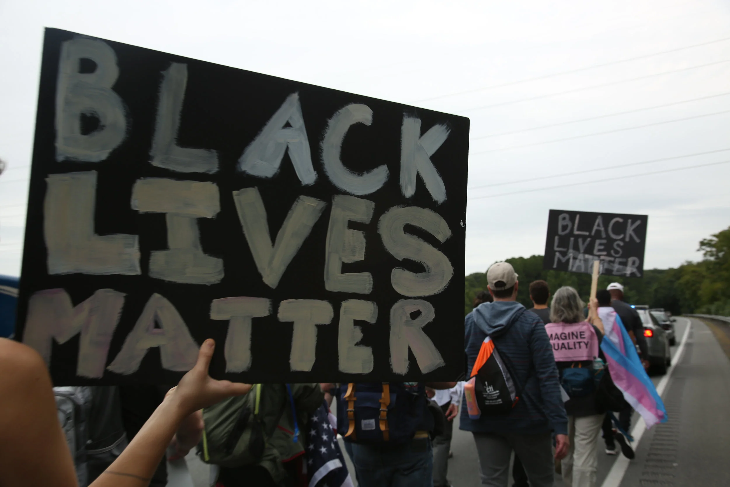 Protesters against white supremacy continue their protest march from Charlottesville to Washington, D.C. along a road in Virginia on September 1, 2017. They set off for the trek on Monday and have reportedly been halted by state police.