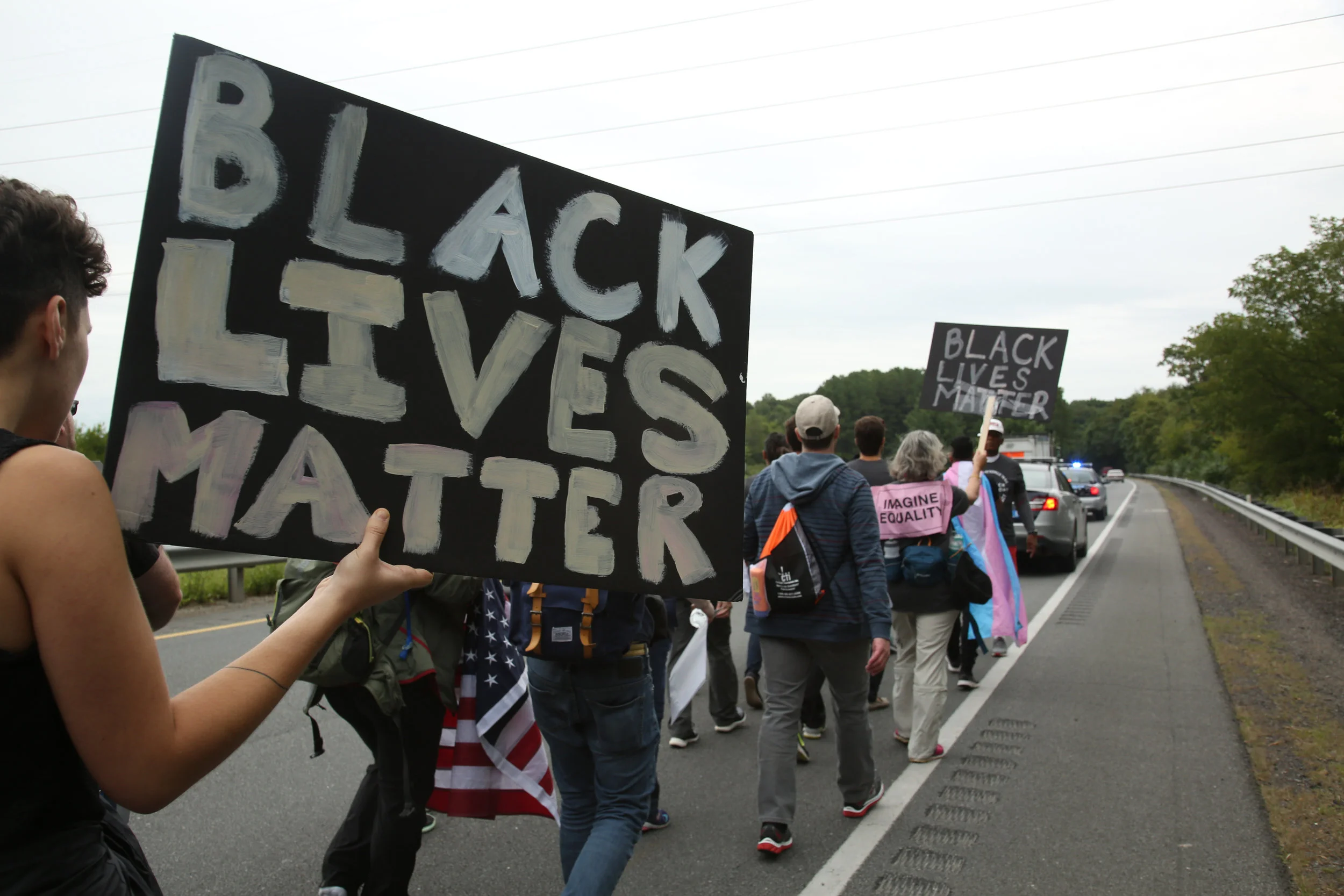 Protesters against white supremacy continue their protest march from Charlottesville to Washington, D.C. along a road in Virginia on September 1, 2017. They set off for the trek on Monday and have reportedly been halted by state police.