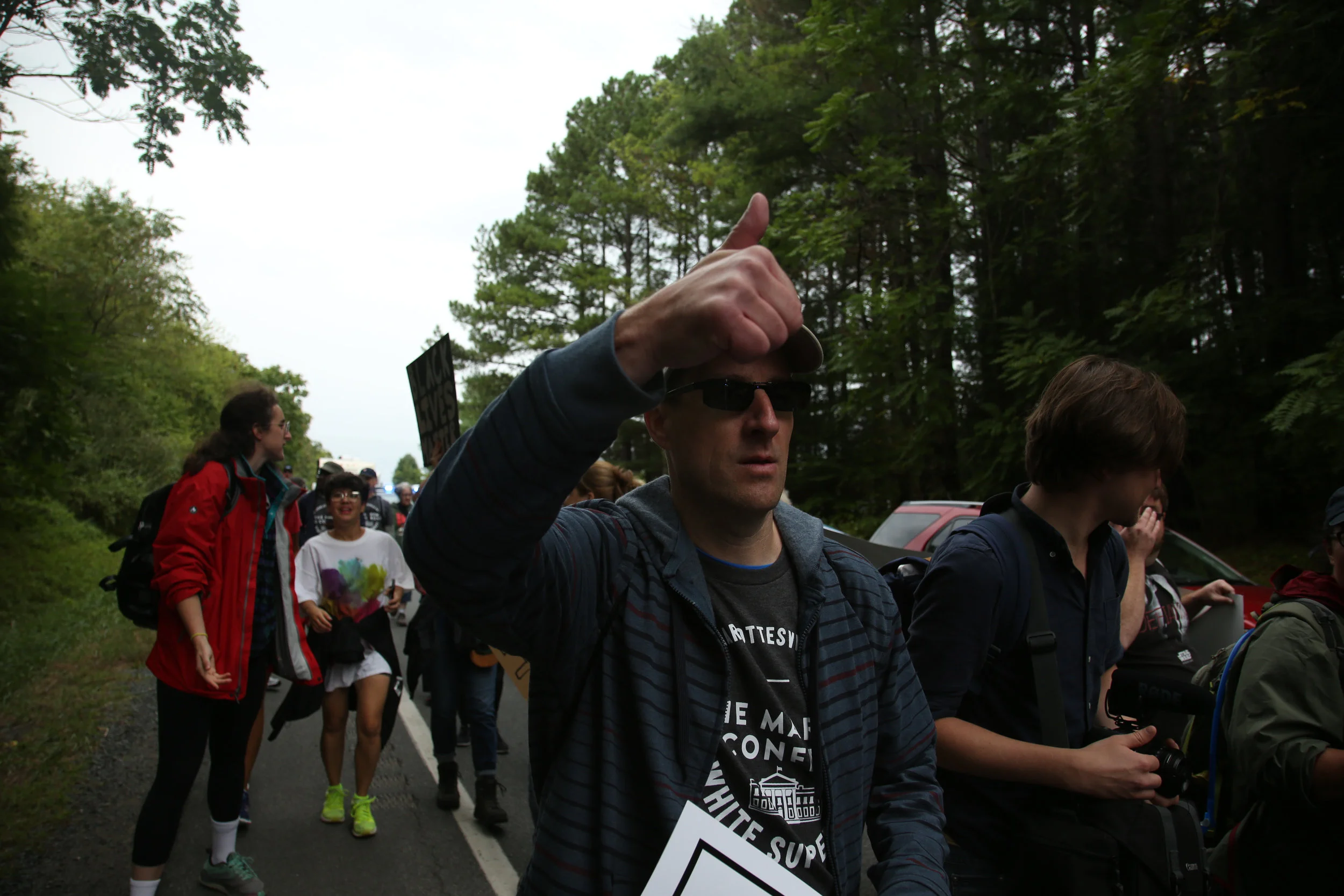 Protesters against white supremacy continue their protest march from Charlottesville to Washington, D.C. along a road in Virginia on September 1, 2017. They set off for the trek on Monday and have reportedly been halted by state police.