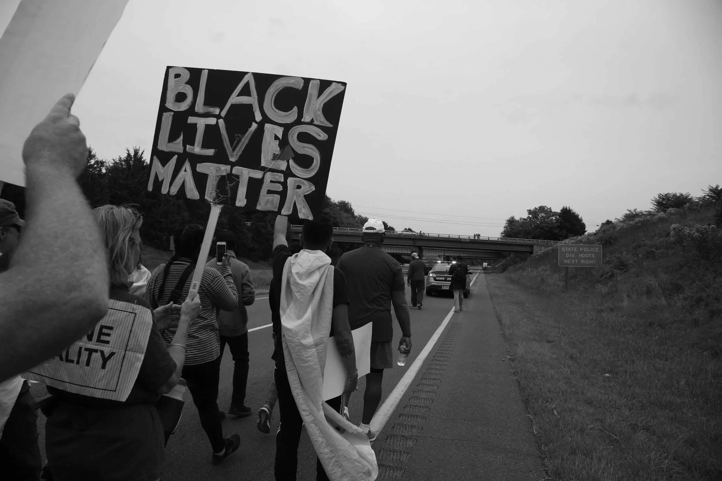 Protesters against white supremacy continue their protest march from Charlottesville to Washington, D.C. along a road in Virginia on September 1, 2017. They set off for the trek on Monday and have reportedly been halted by state police.