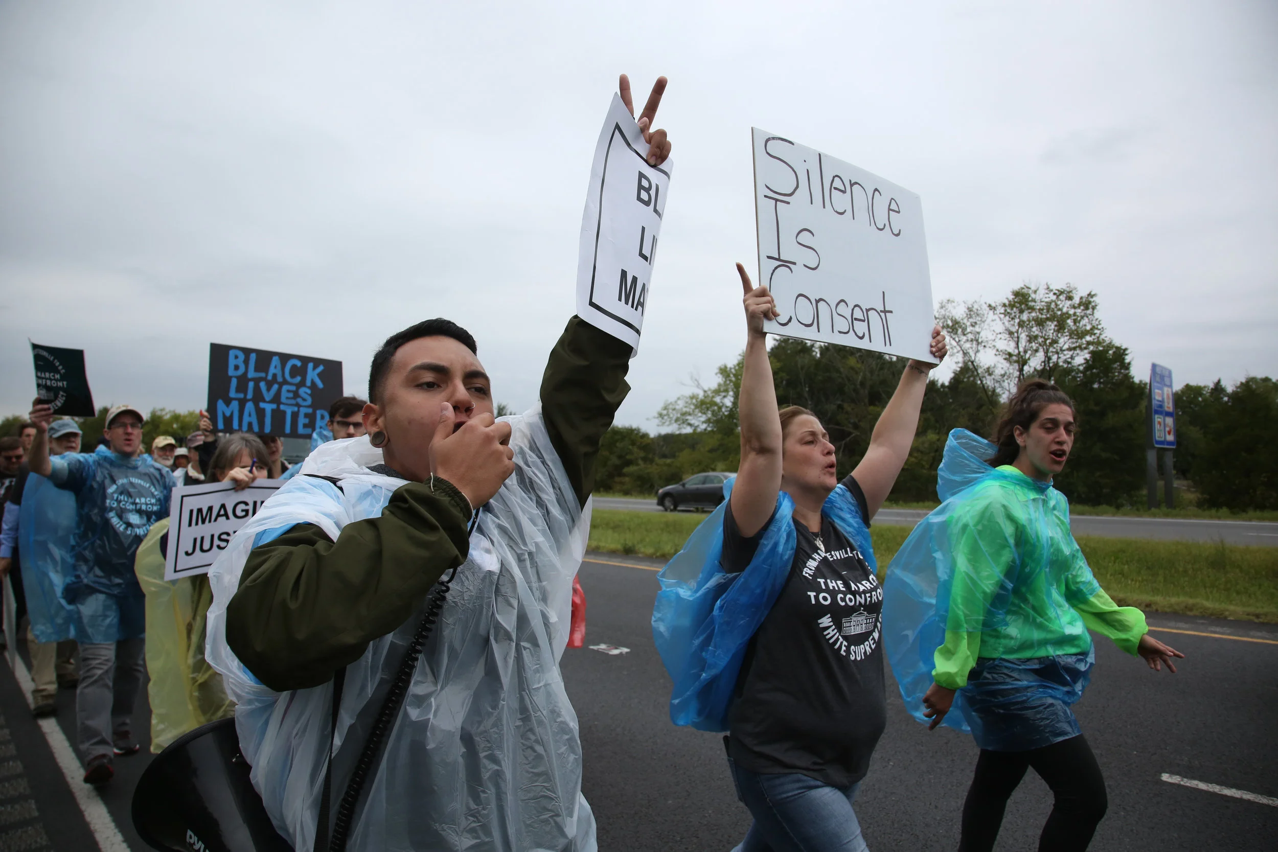 Protesters against white supremacy continue their protest march from Charlottesville to Washington, D.C. along a road in Virginia on September 1, 2017. They set off for the trek on Monday and have reportedly been halted by state police.