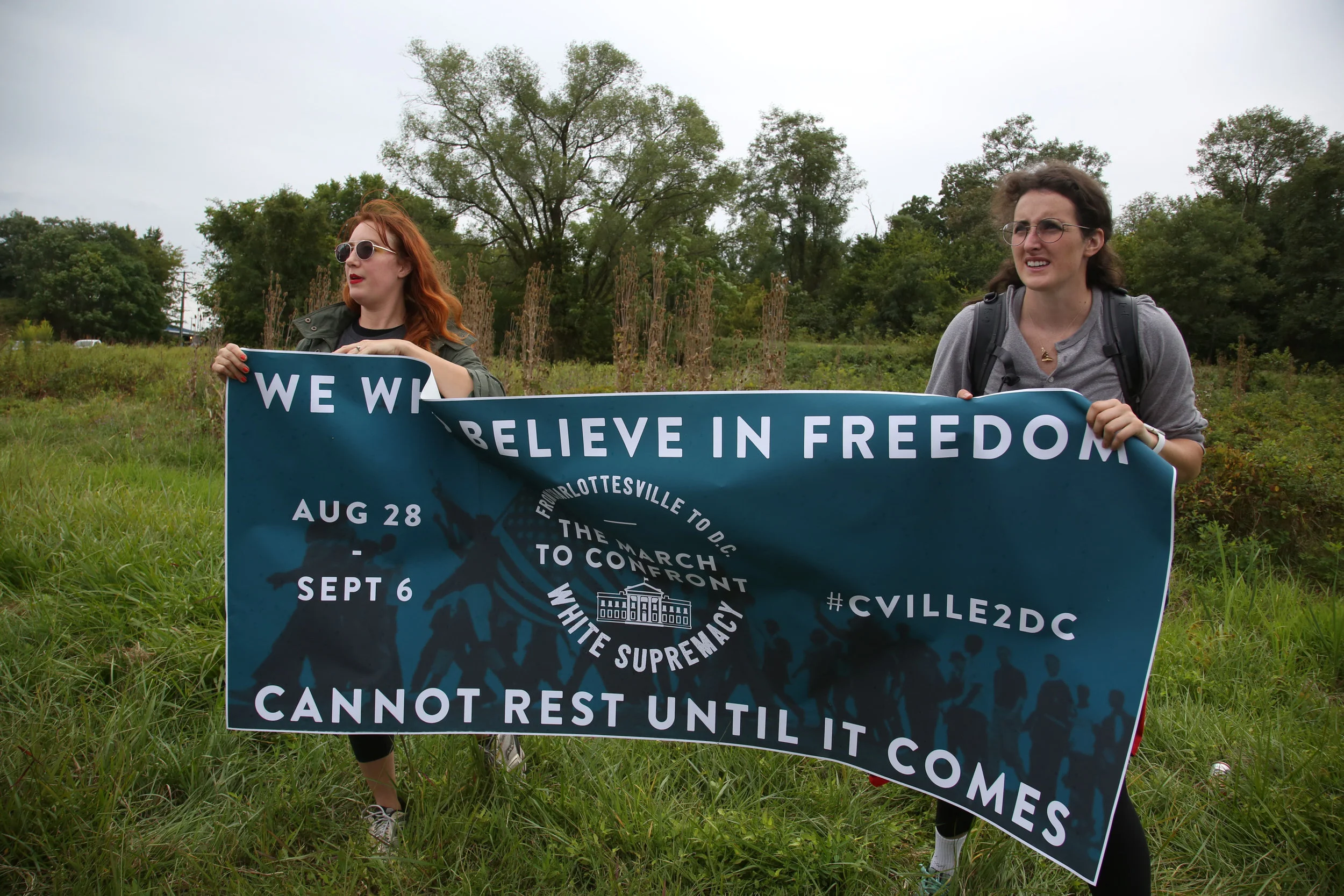 Protesters against white supremacy continue their protest march from Charlottesville to Washington, D.C. along a road in Virginia on September 1, 2017. They set off for the trek on Monday and have reportedly been halted by state police.