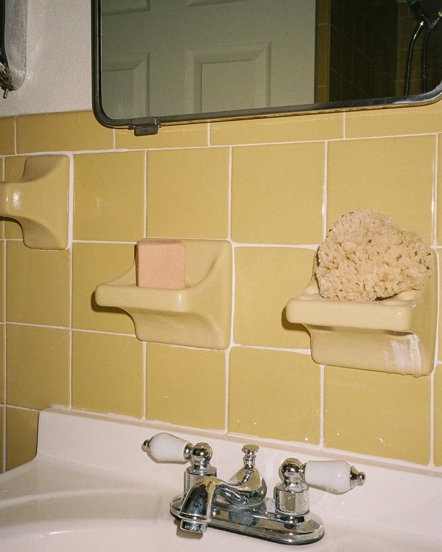 Our Turmeric and Oatmeal Soap and Sea Wool Sponge looking cute in my grandparents bathroom ✨