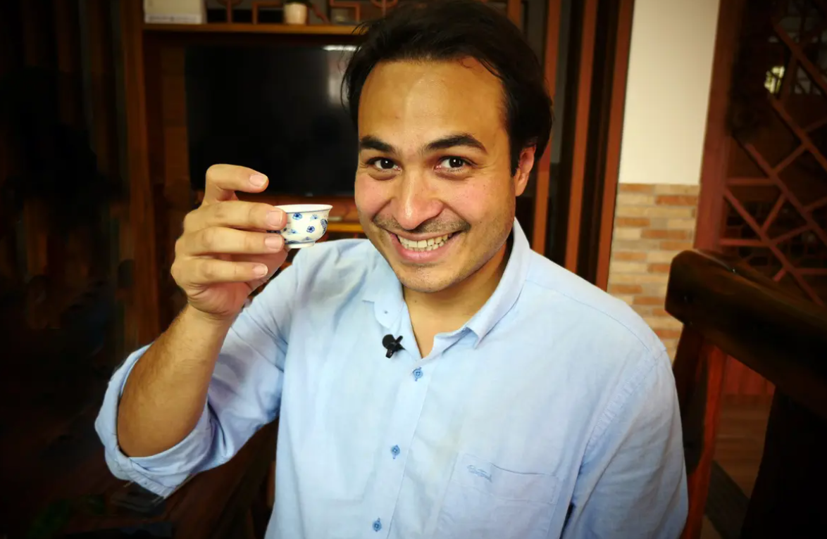 Aman - Son Mei -holding a small cup