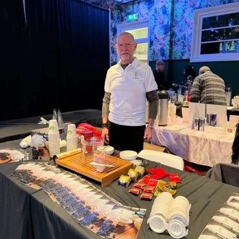 Dirk Wens, creator of ChaDan. He's standing at a table where there are ChaDans and some other teaware and teas