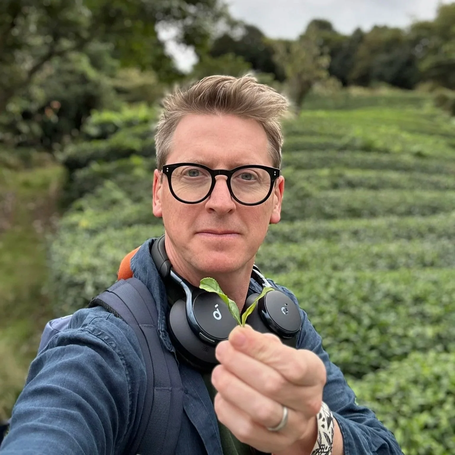 Oscar Woolley  holding a tea leaf