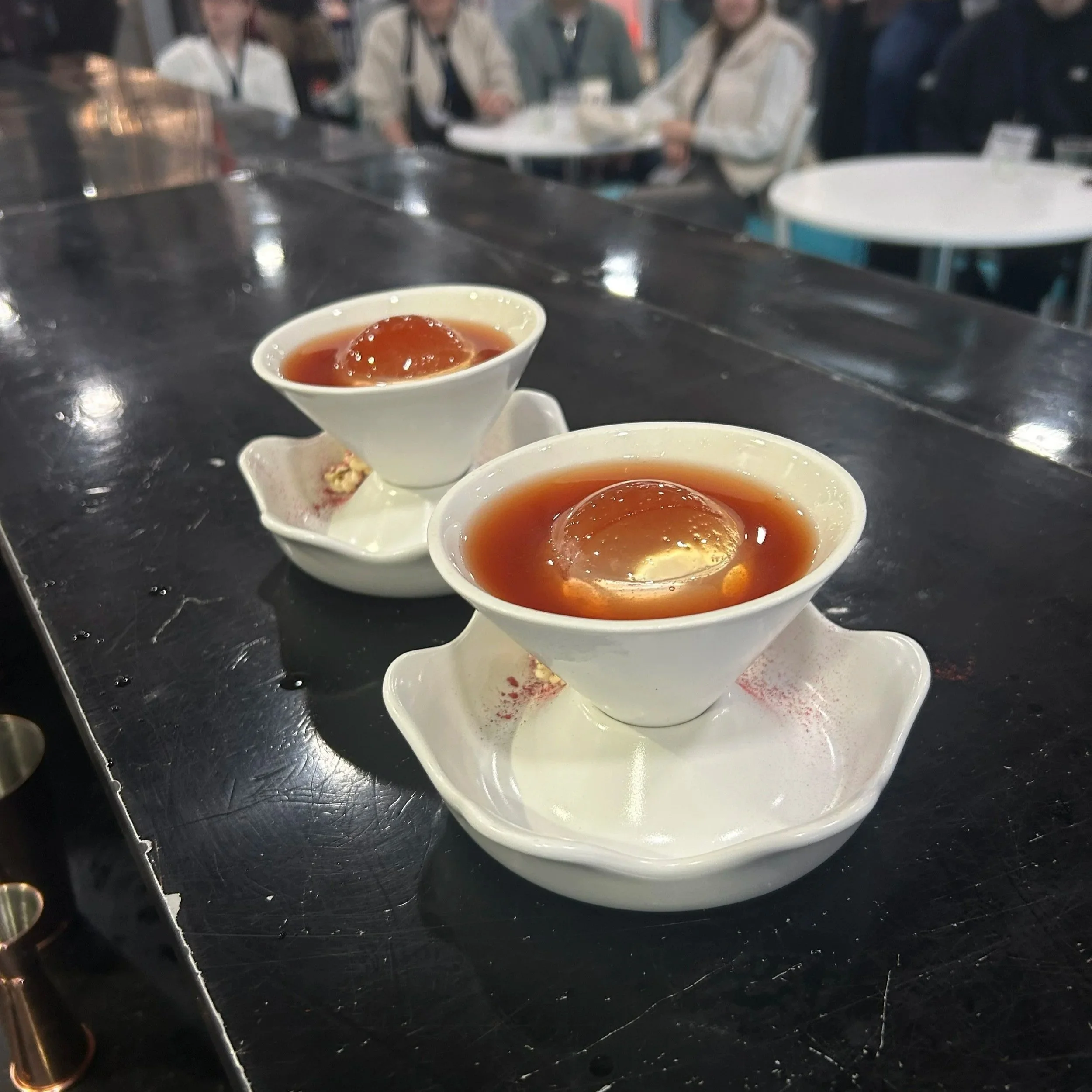 Two cups with a bol of ice
