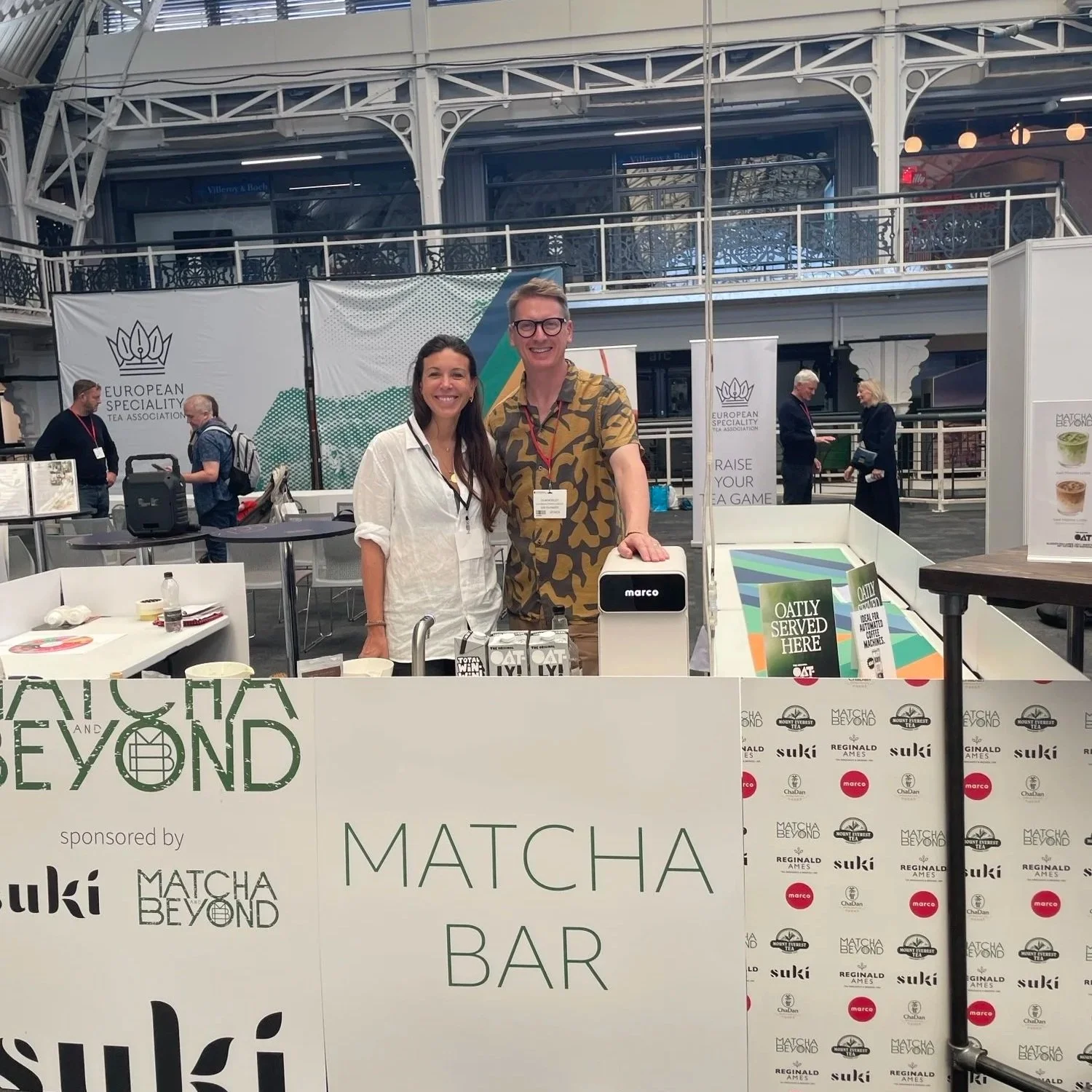 Two people at the Matcha Bar stand