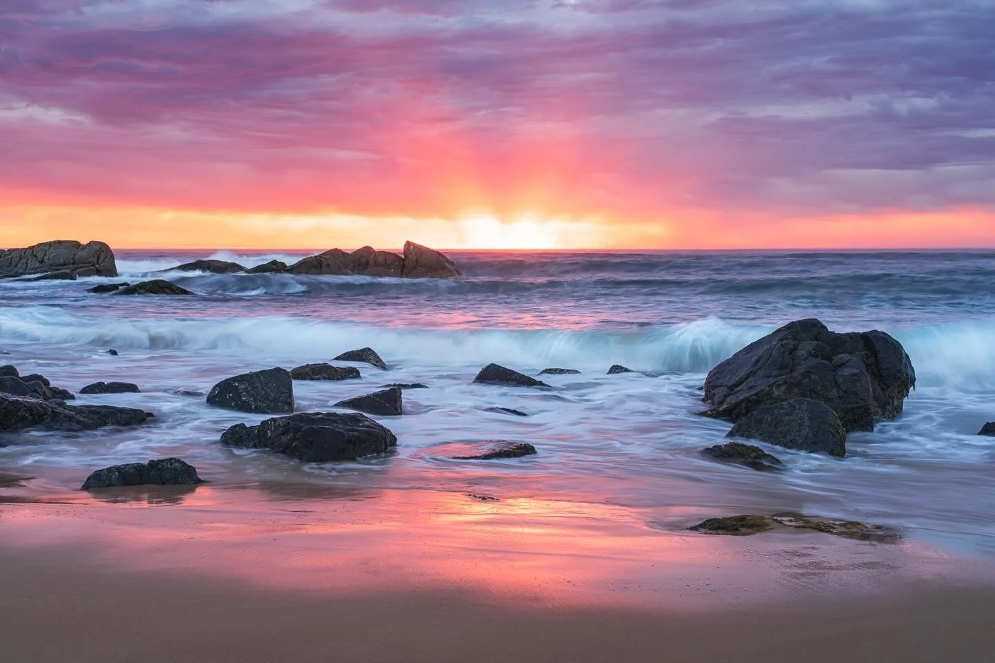 &ldquo;Vivacious&rdquo;

Sunrise / Meringo Beach, Eurobodalla, NSW, Australia.

Arriving in pitch darkness, except for  sliver of red on the horizon.
A heavy band of cloud kept the light subdued, but could do nothing to halt those glorious rays of re