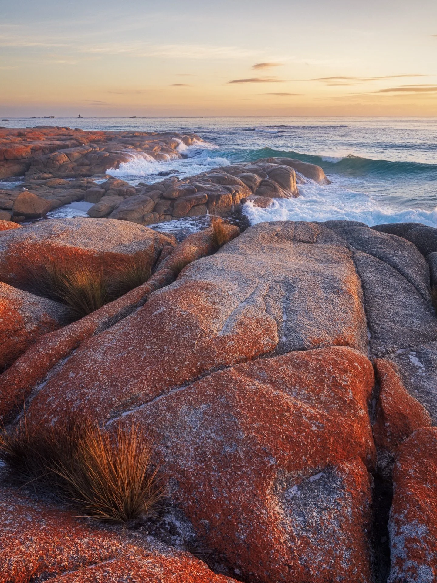 &ldquo;Fired!&rdquo;
Sunrise / Bay of Fires, Tasmania, Australia 

As if these rocks need any more &ldquo;Firing Up&rdquo;.
Sunrise seems to enhance the burning in &hellip; Bay of Fires!!