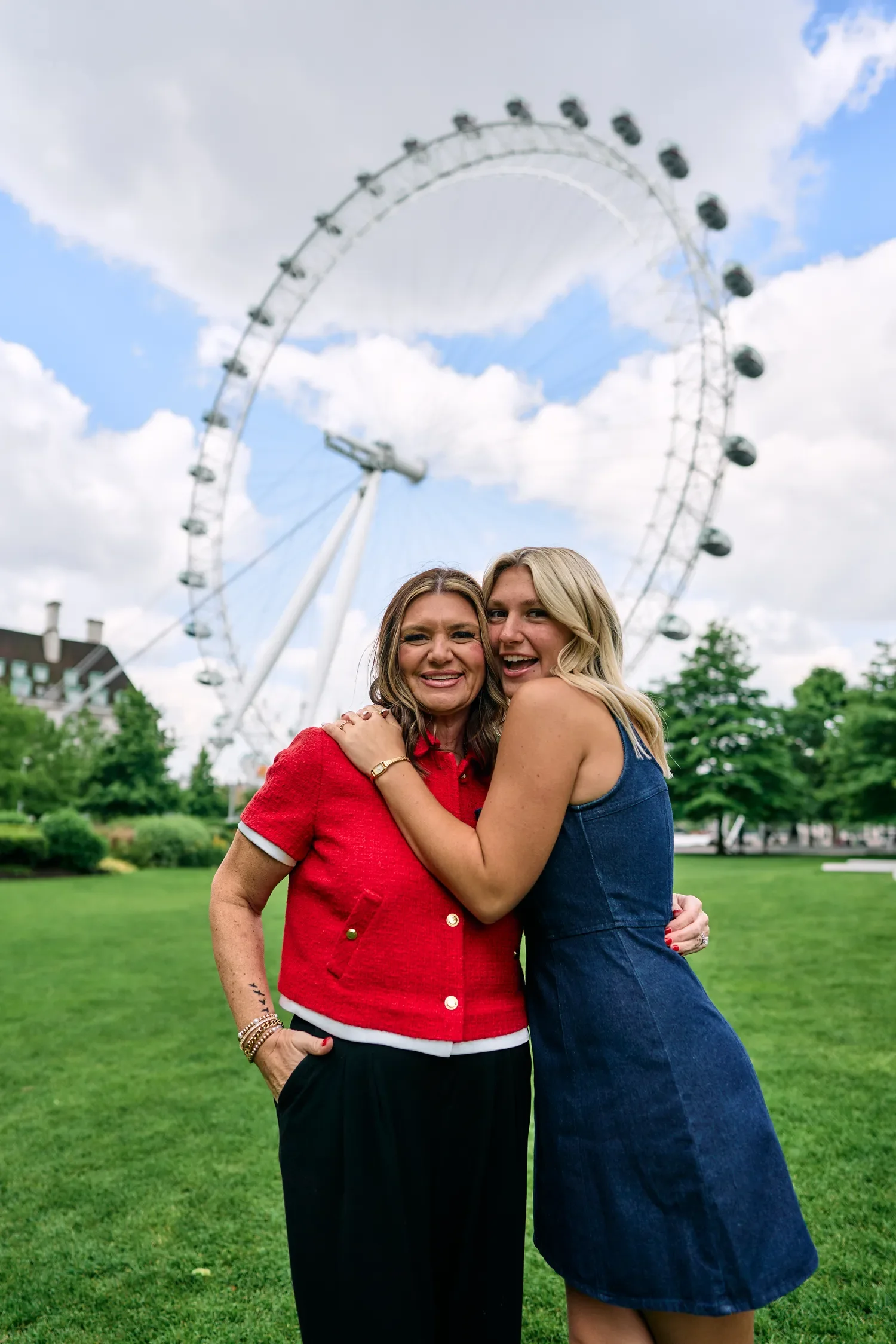 School senior with her mum at Jubilee Gardens, South Bank, with the London Eye in the background