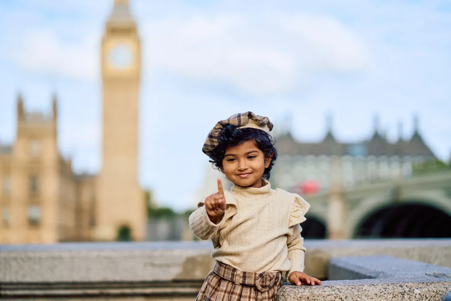 Family photoshoot by Big Ben and on Westminster Bridge