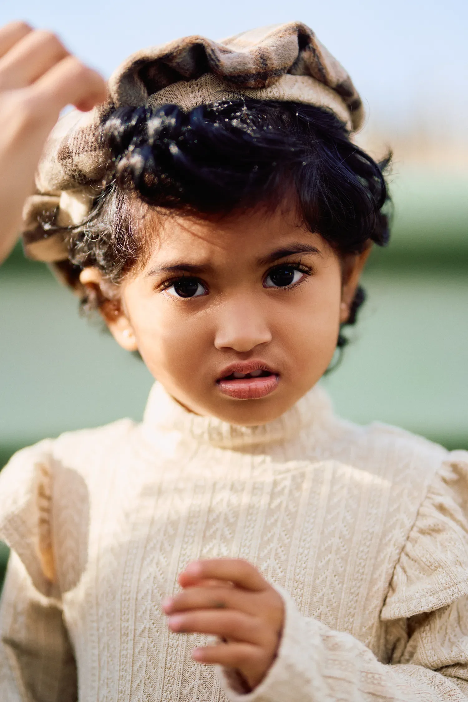 Close-up portrait of toddler on Westminster Bridge, London family photography
