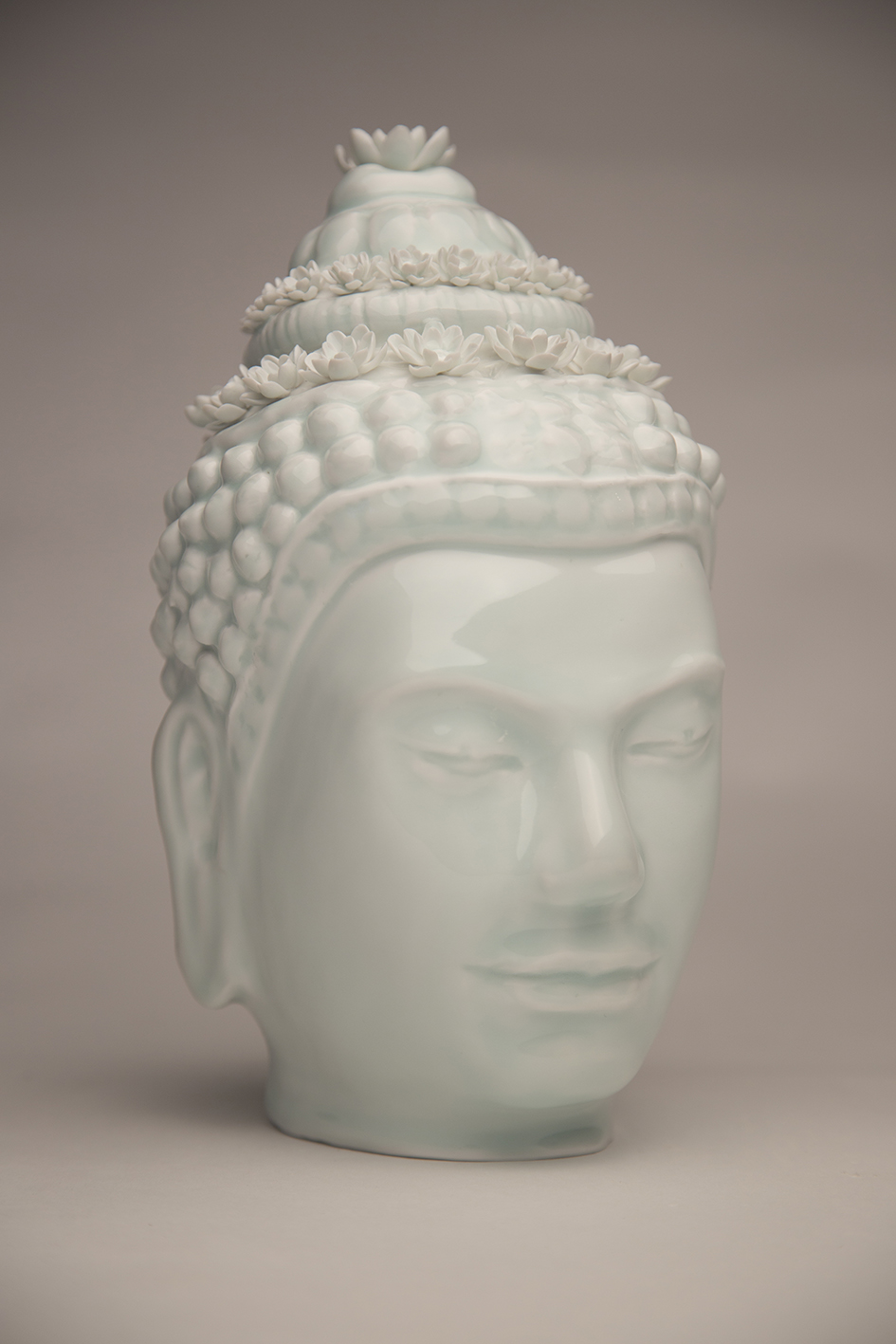 OA 1951.11-12.1 Head of Buddha given by Colonel M. Earle (Jade celadon with lotus flowers)