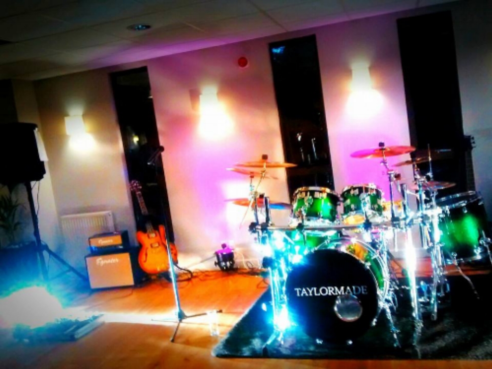 Taylormade Live Band set up with the acoustic drum kit at Ashorne Hill House Wedding Venue, Warwickshire.