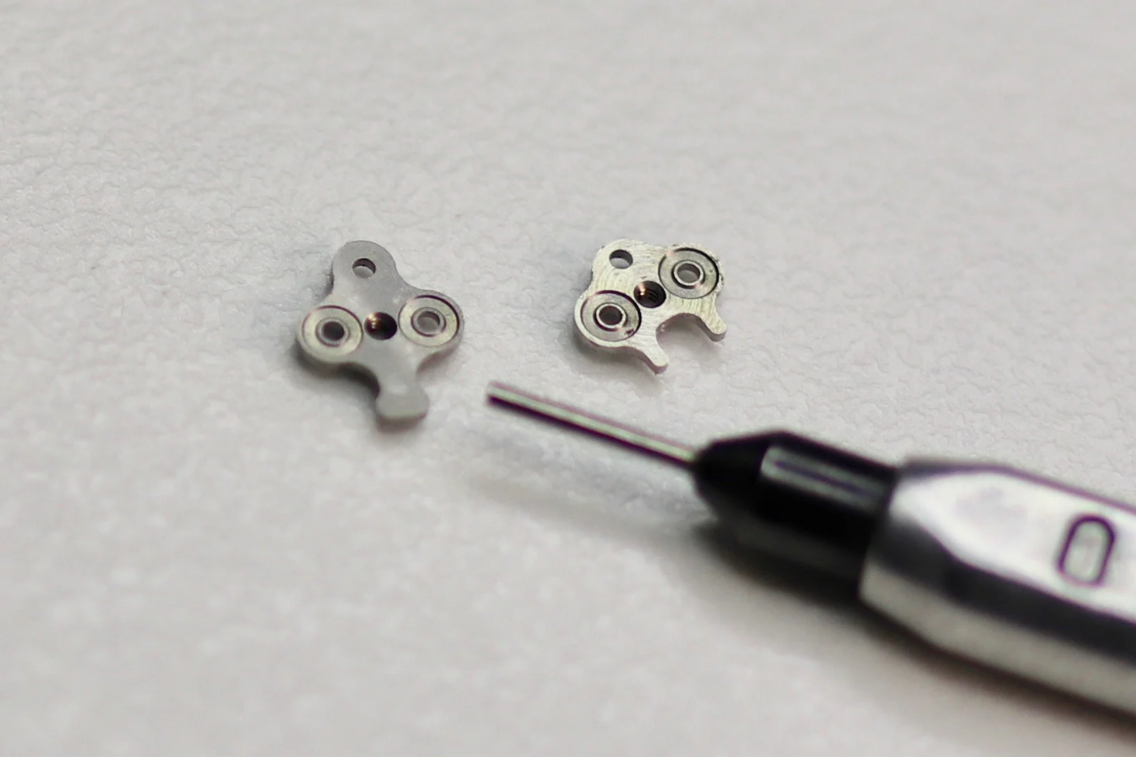 Rocking levers for an automatic mechanism