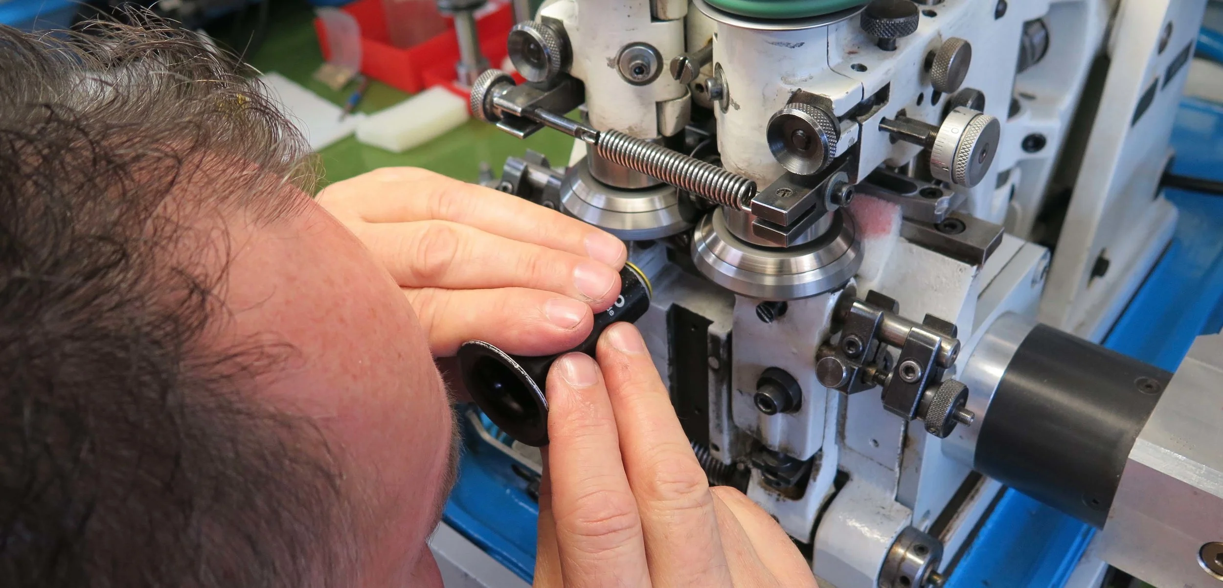 Checking the pinion as the pivots are being burnished.
