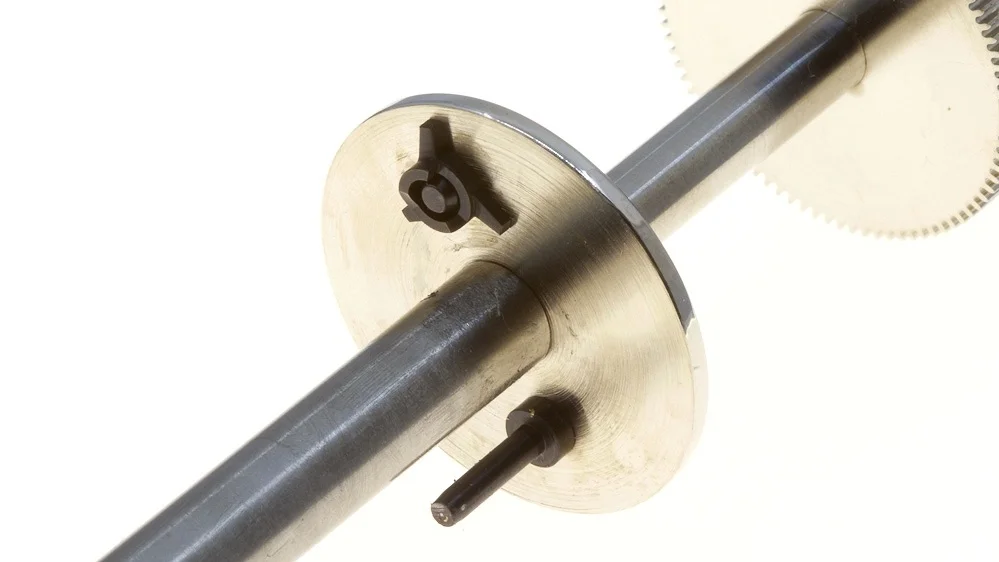 The three toothed cams position dictates which tune is played.
