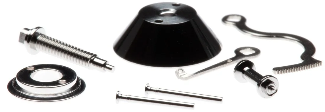 Some of the steel components that make up the power reserve system prior to being assembled.