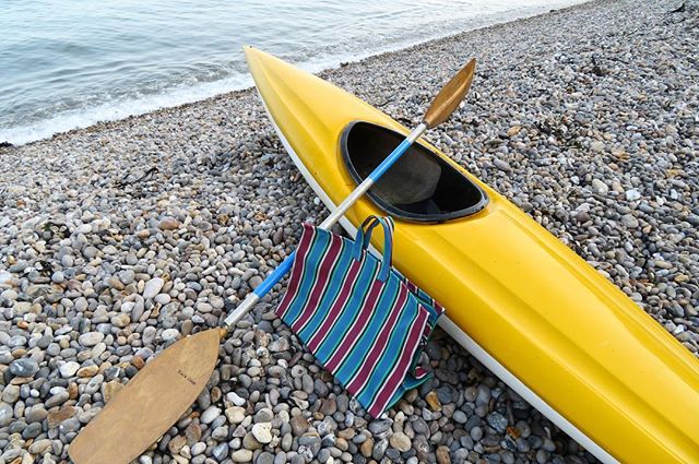 Picnic on the beach with our UPcycled kayak, oar and recycled shopping bag. We&rsquo;ve got these on the website and in the shop! Can you believe the things people throw away?