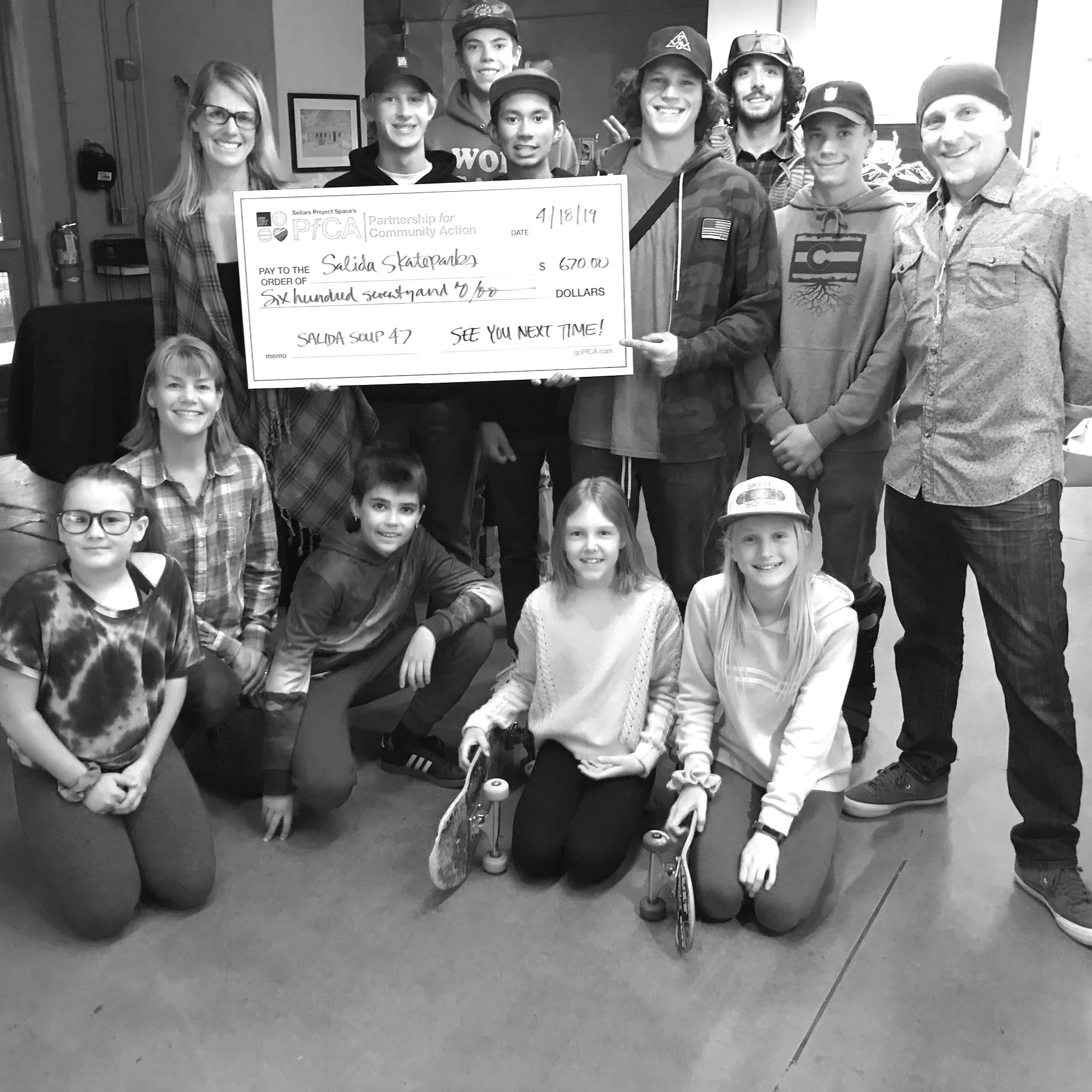 The Friends of Salida Skateparks crew poses with the Big Check after their Salida Soup 47 win.